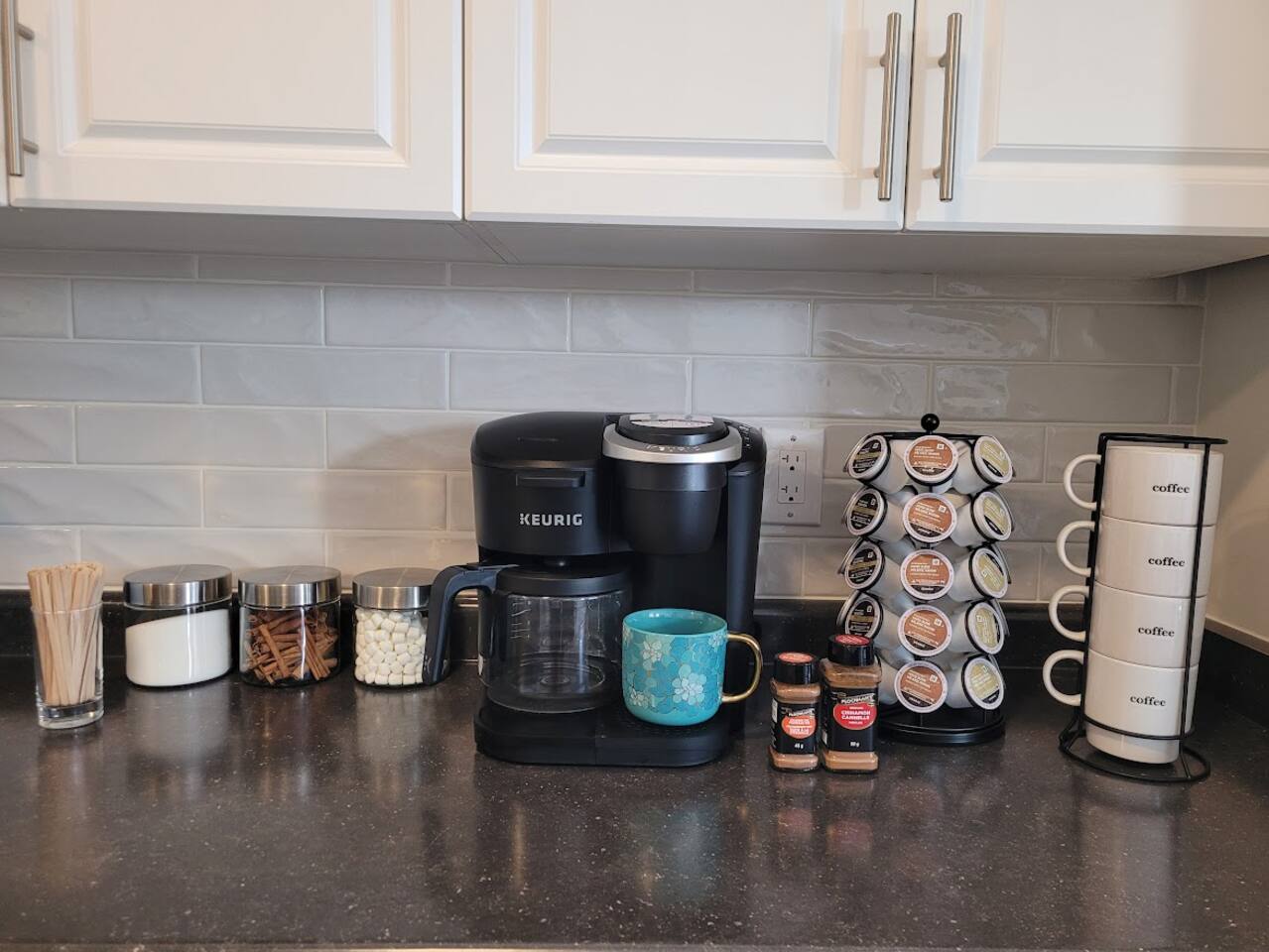 Coffee Bar for your enjoyment! Coffee/latte pods & ground coffee included. Also included: sugar, sweetener, marshmallows, pumpkin spice, cinnamon spice and cinnamon sticks!