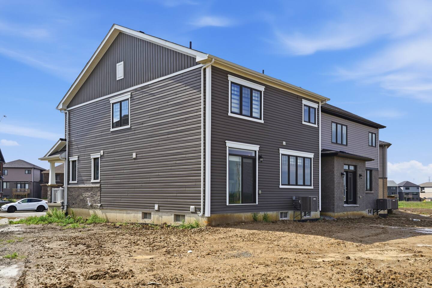 This house is a new build and the backyard will be installed this summer