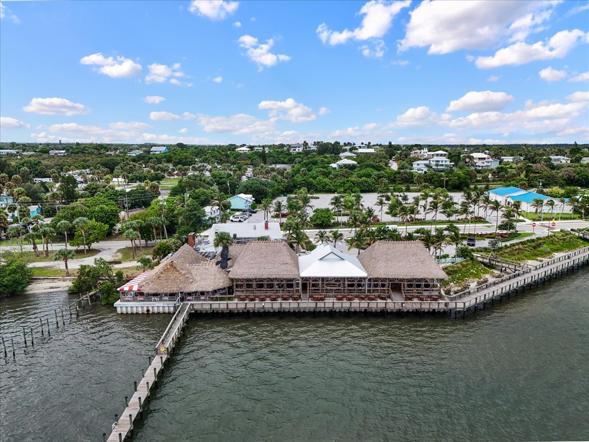Tropical waterfront views with private dock and island-style charm