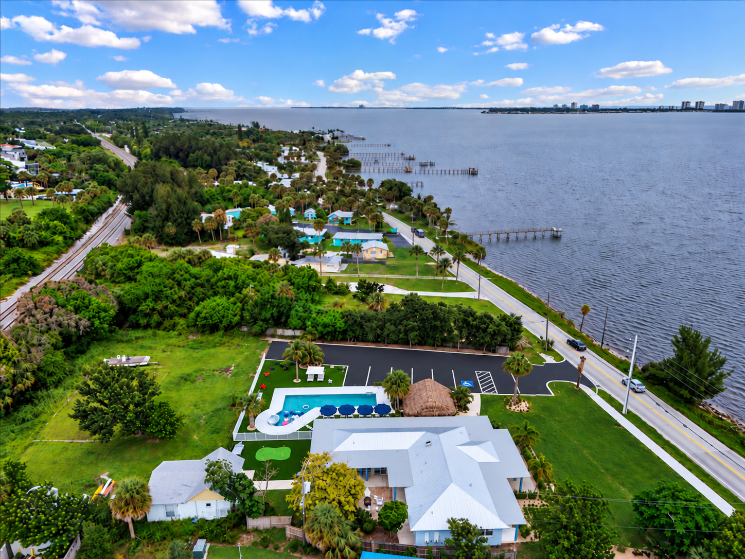 Stunning bayfront retreat with pool, tropical grounds, and panoramic views