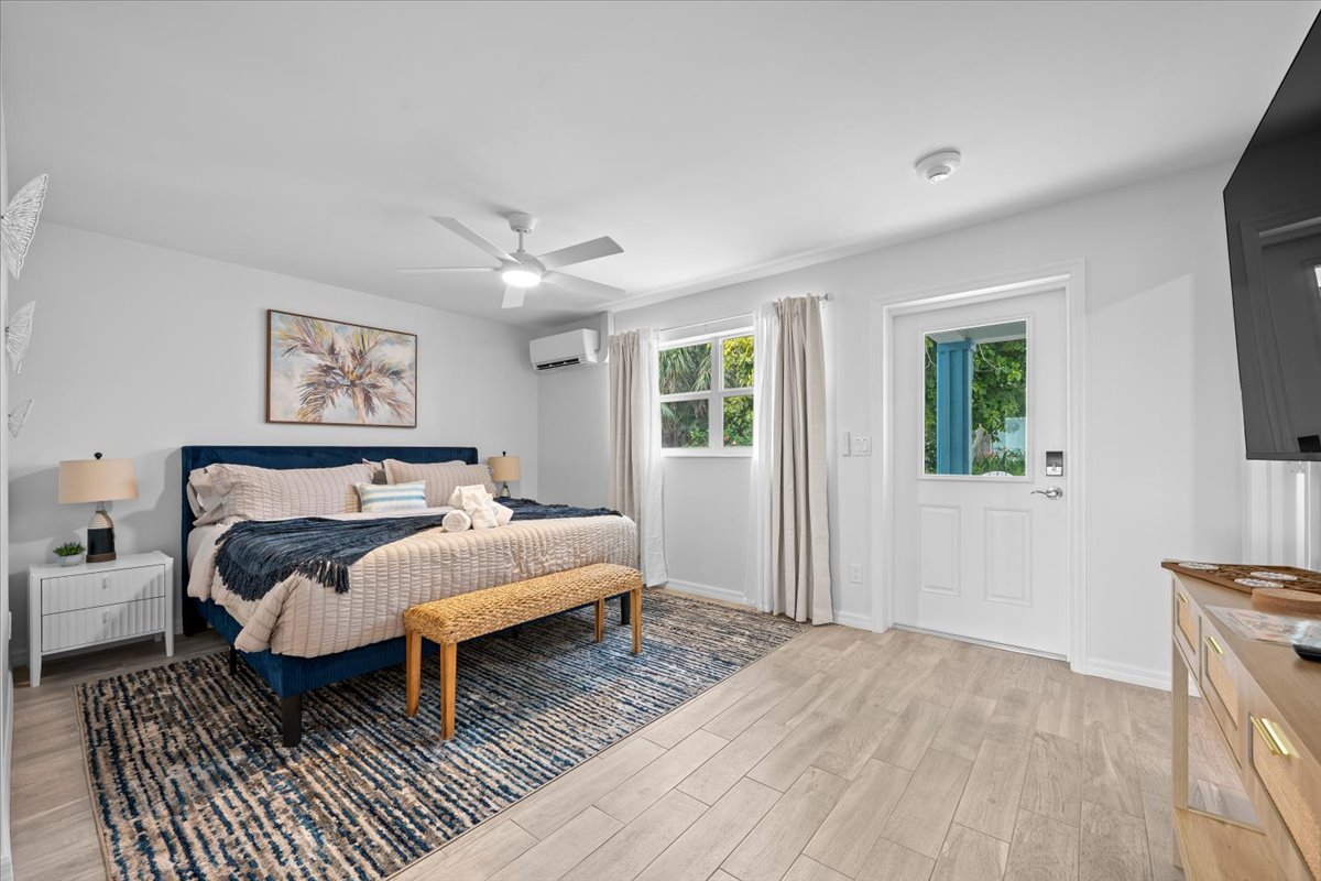 Bright king bedroom with modern style and private outdoor access