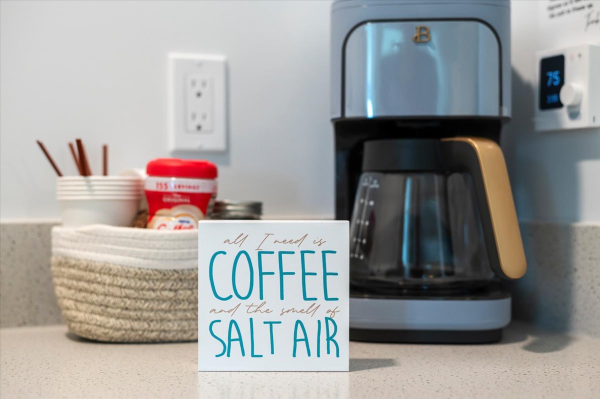 Cozy coastal coffee station with modern brewer and thoughtful touches