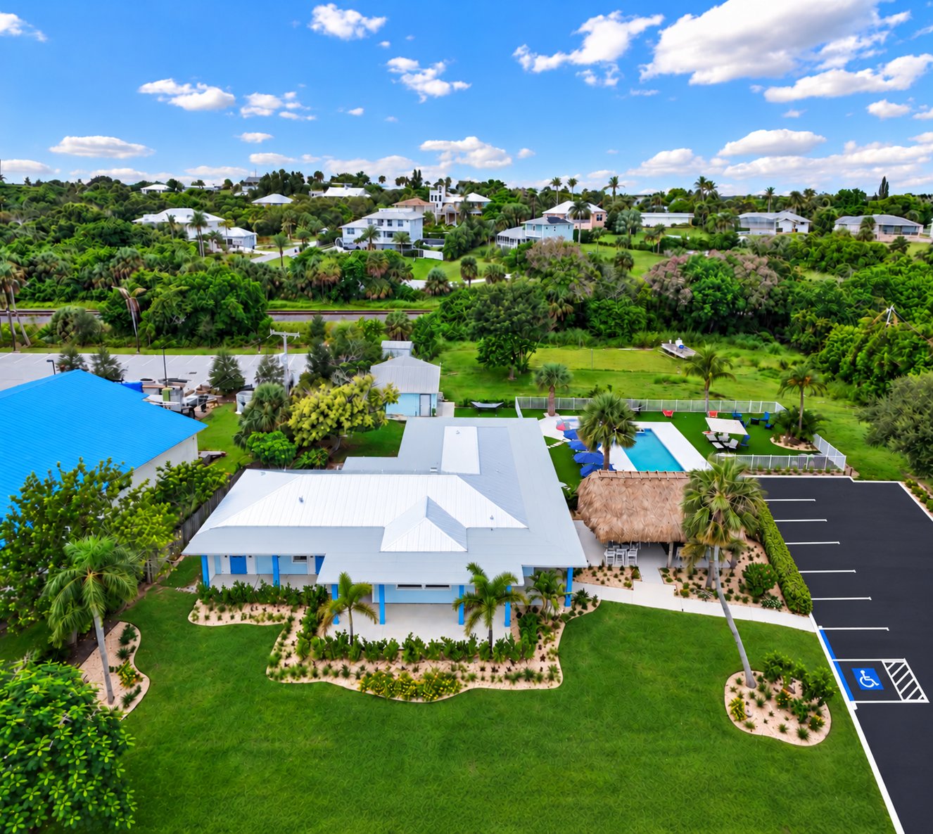 Tropical retreat with private pool, tiki lounge, and lush open views