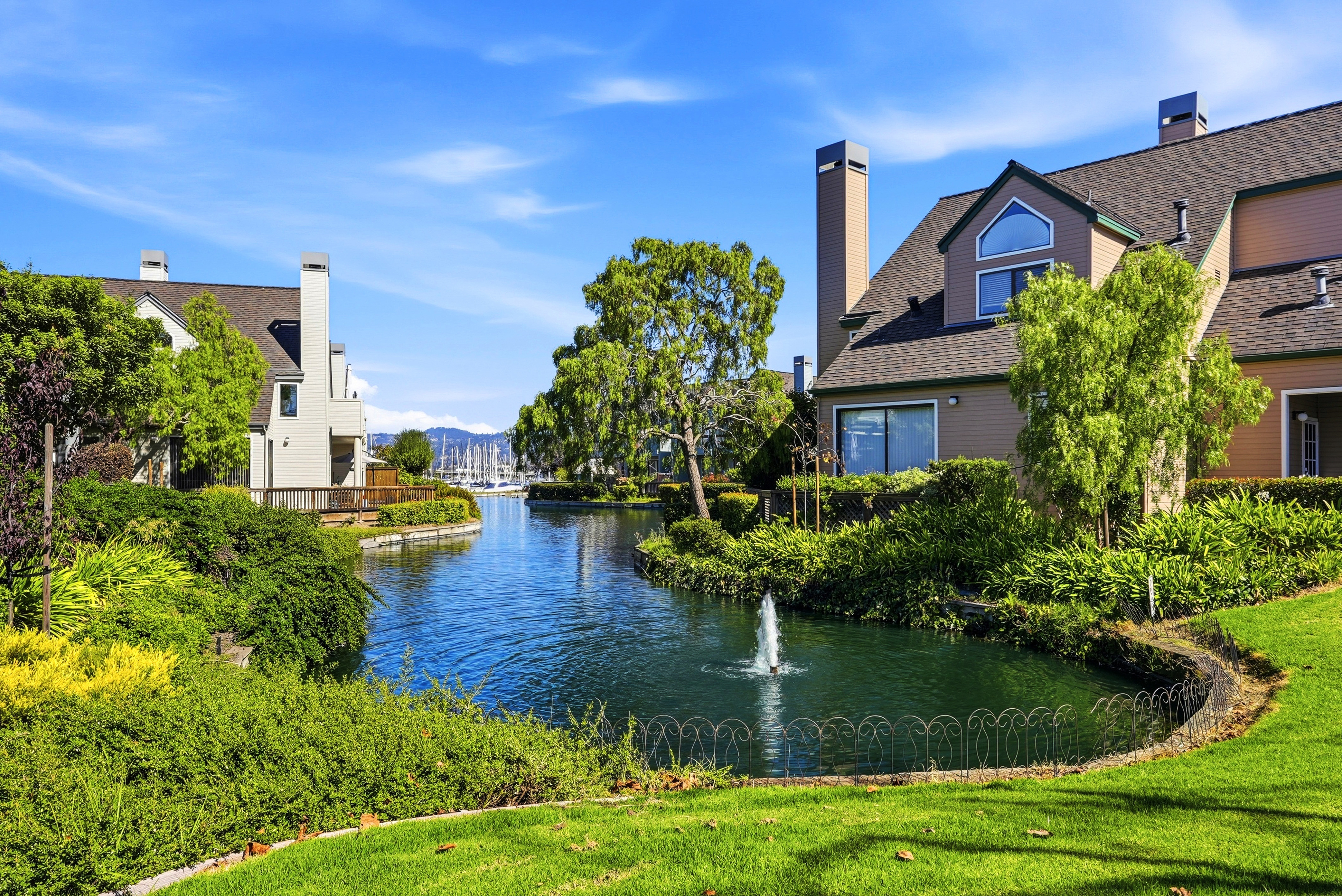Scenic lagoon views with lush landscaping and a peaceful resort-like setting