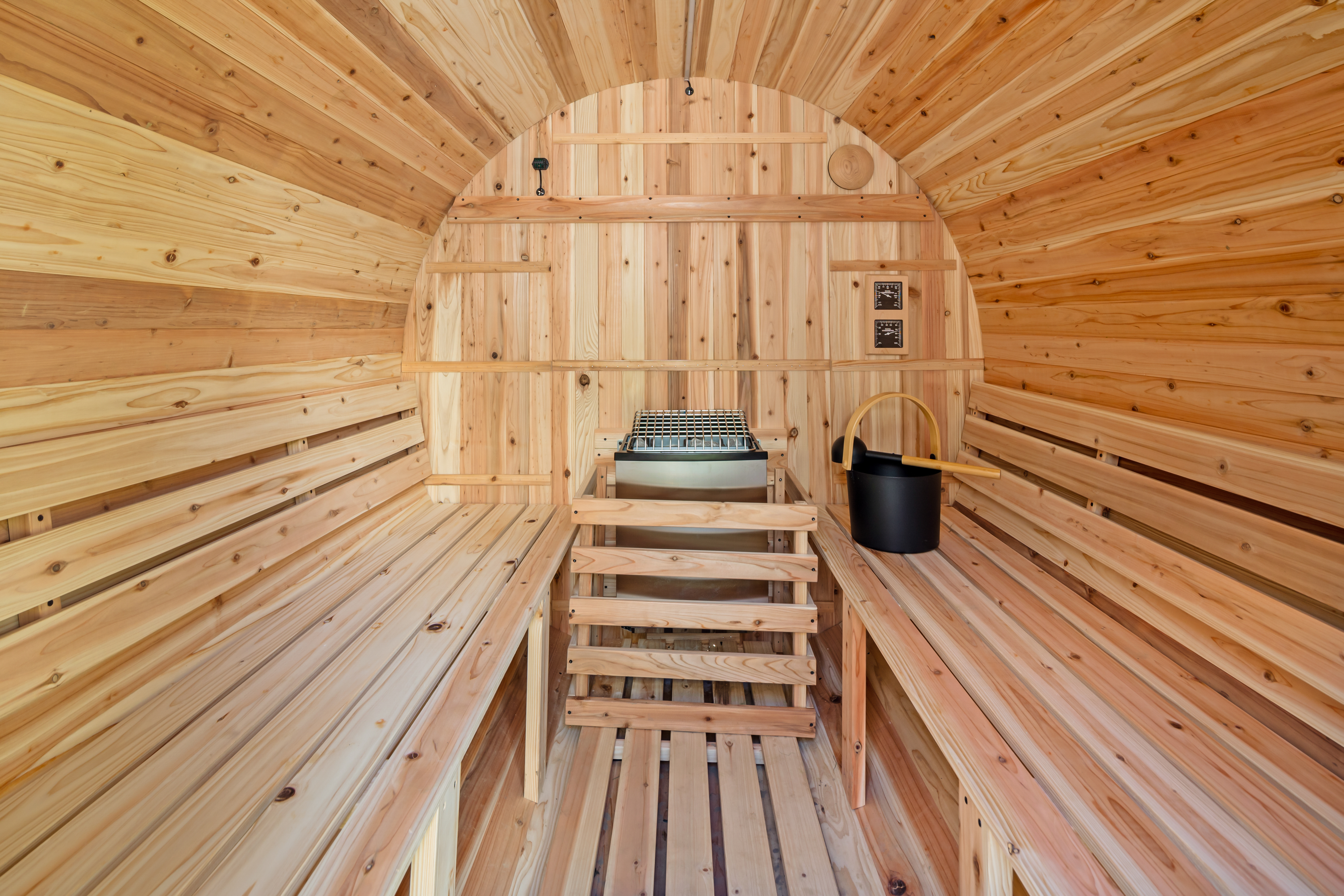 Private cedar sauna with spa-like warmth and classic rustic charm