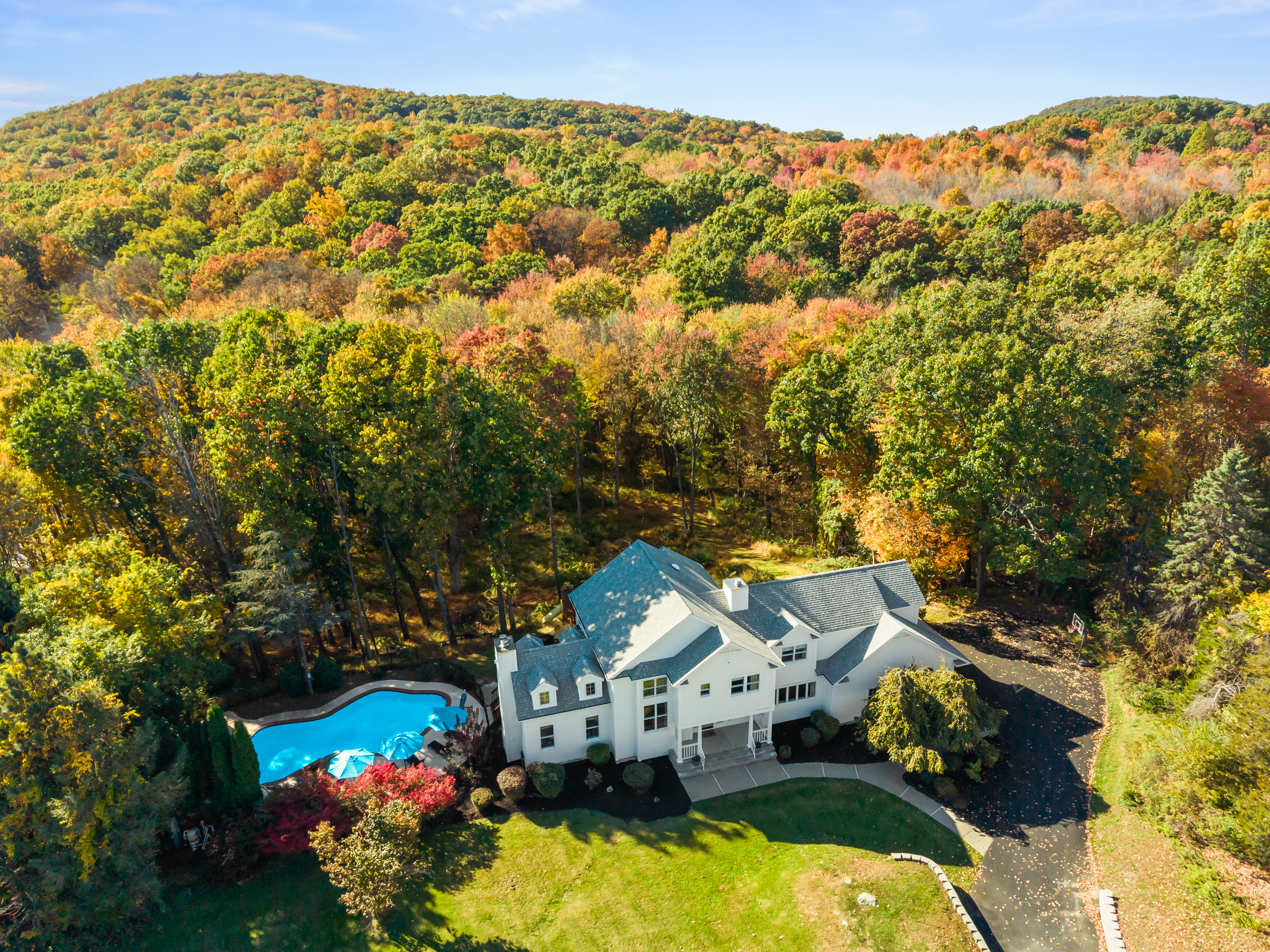 Private hillside retreat with pool and stunning fall foliage views
