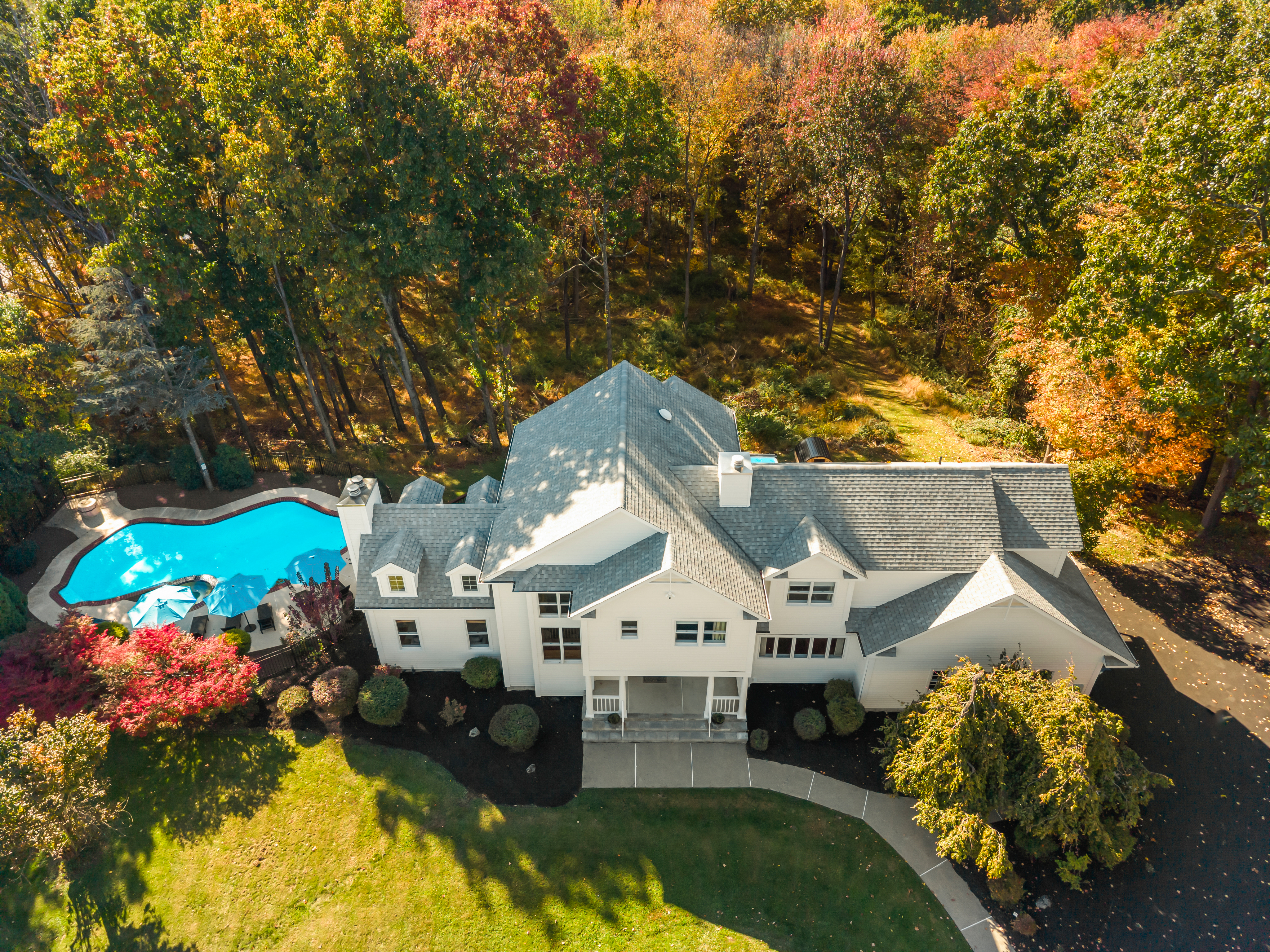 Private estate with pool, wooded privacy, and stunning fall views