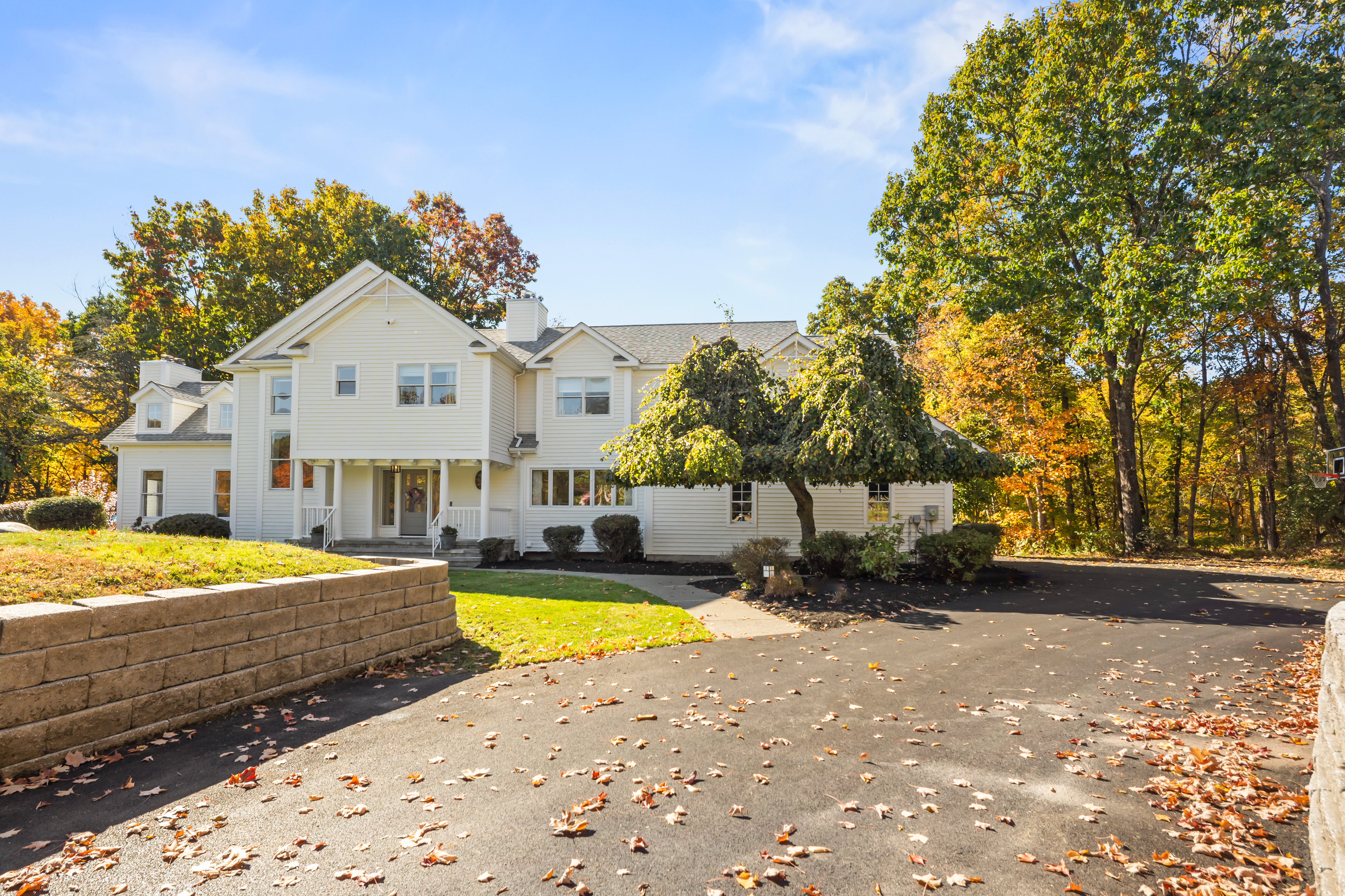 Spacious private home with large driveway and scenic autumn surroundings