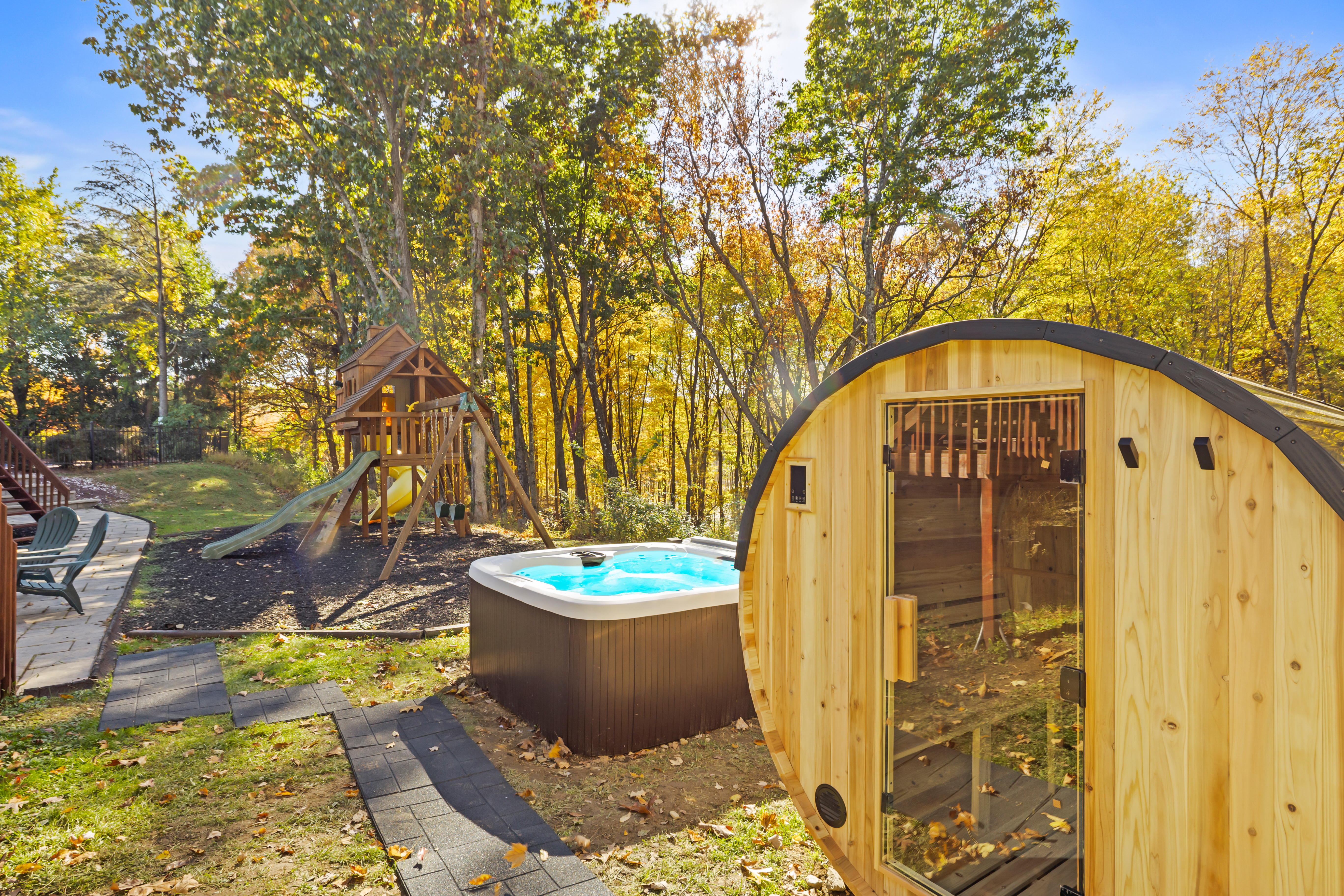 Relax outdoors with a hot tub, sauna, and family-friendly backyard retreat