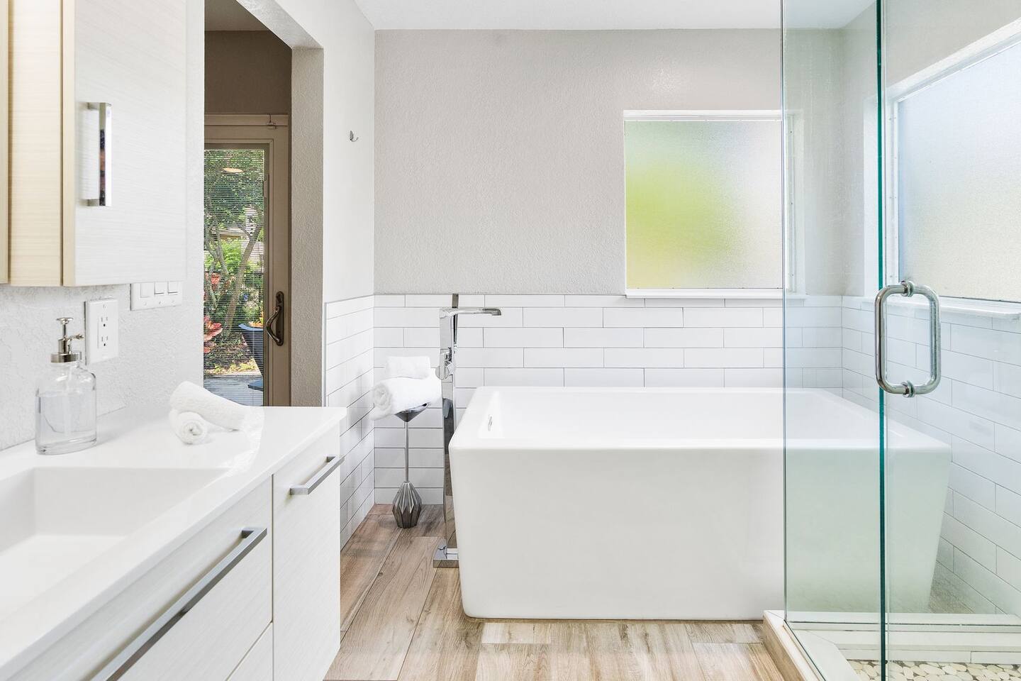 Master Bathroom with separate tub and stand-alone shower