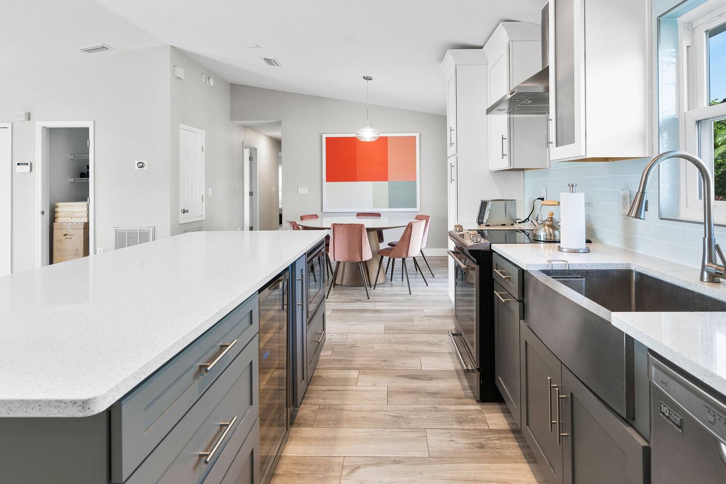Full Size Kitchen with ALL Appliances: fridge, freezer, microwave, stove, oven, wine fridge, smart toaster, air fryer, coffee maker, and blender.