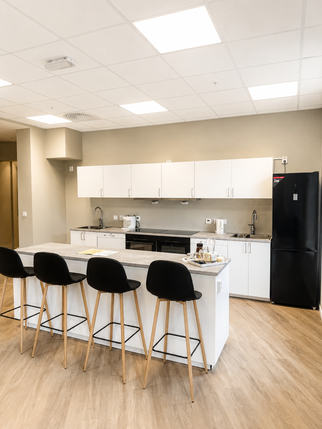 Bright modern kitchen with large island seating for four
