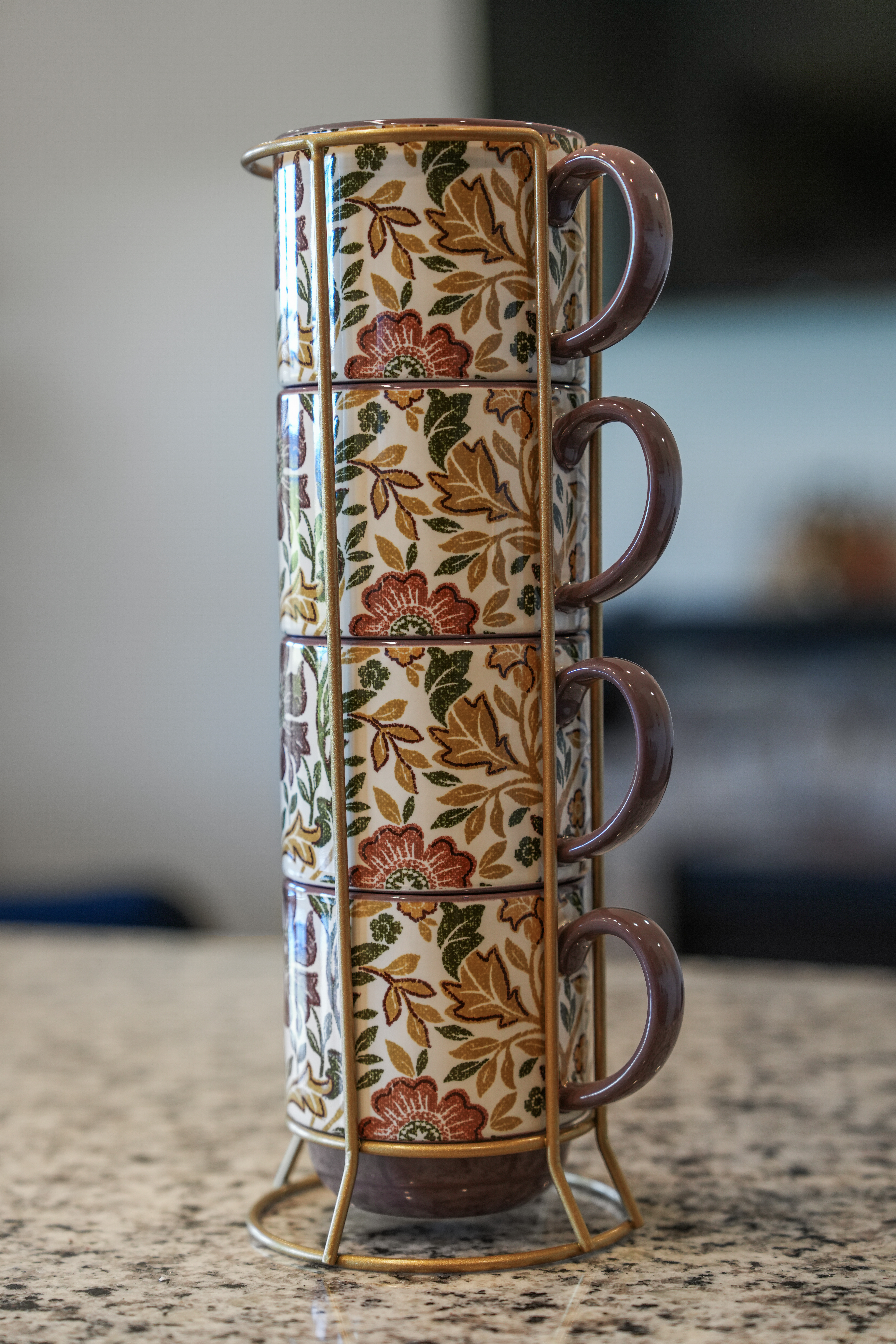 Charming floral mug set adds a cozy touch to the kitchen coffee station