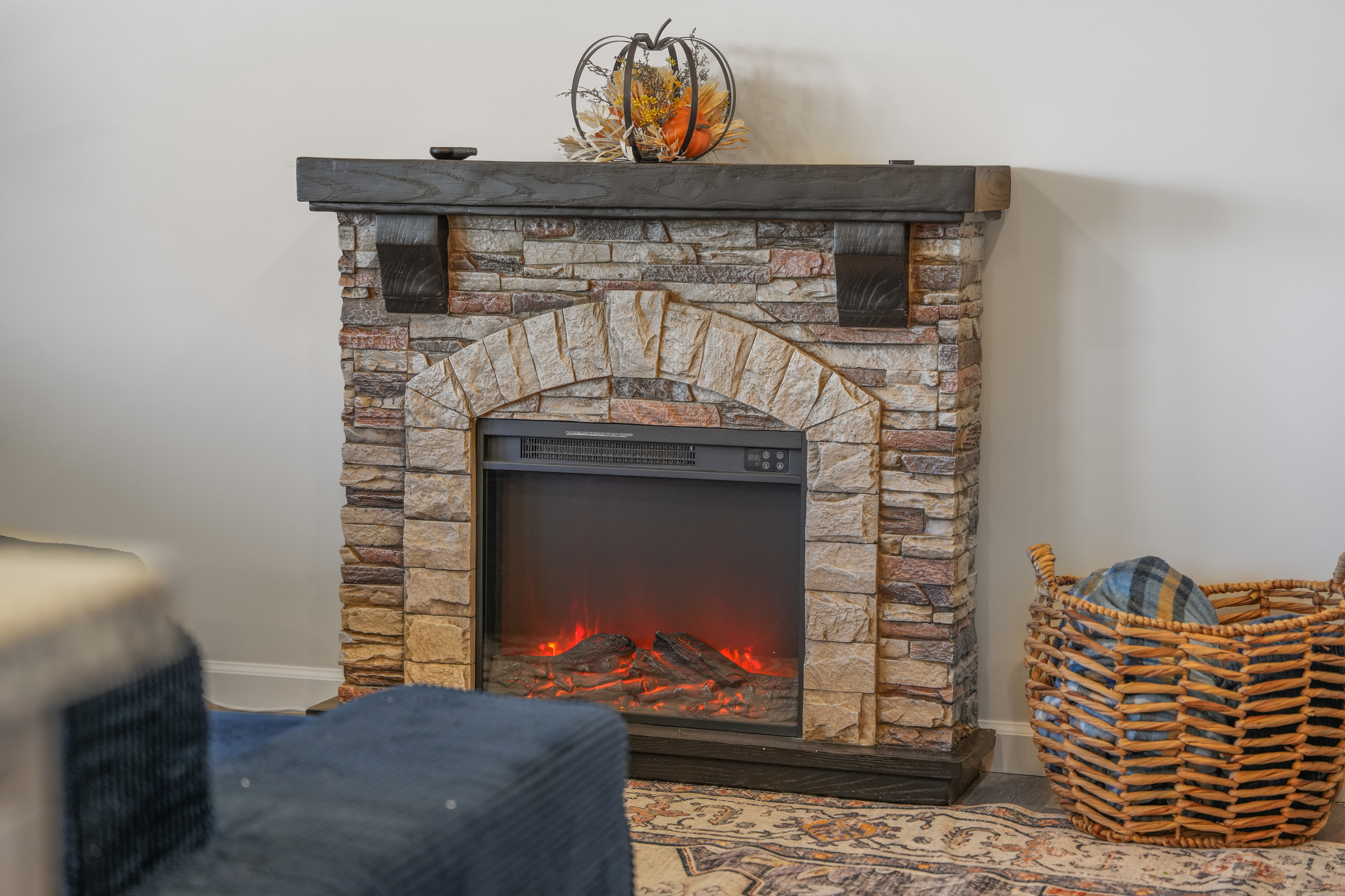Cozy stone fireplace with warm ambiance and rustic charm
