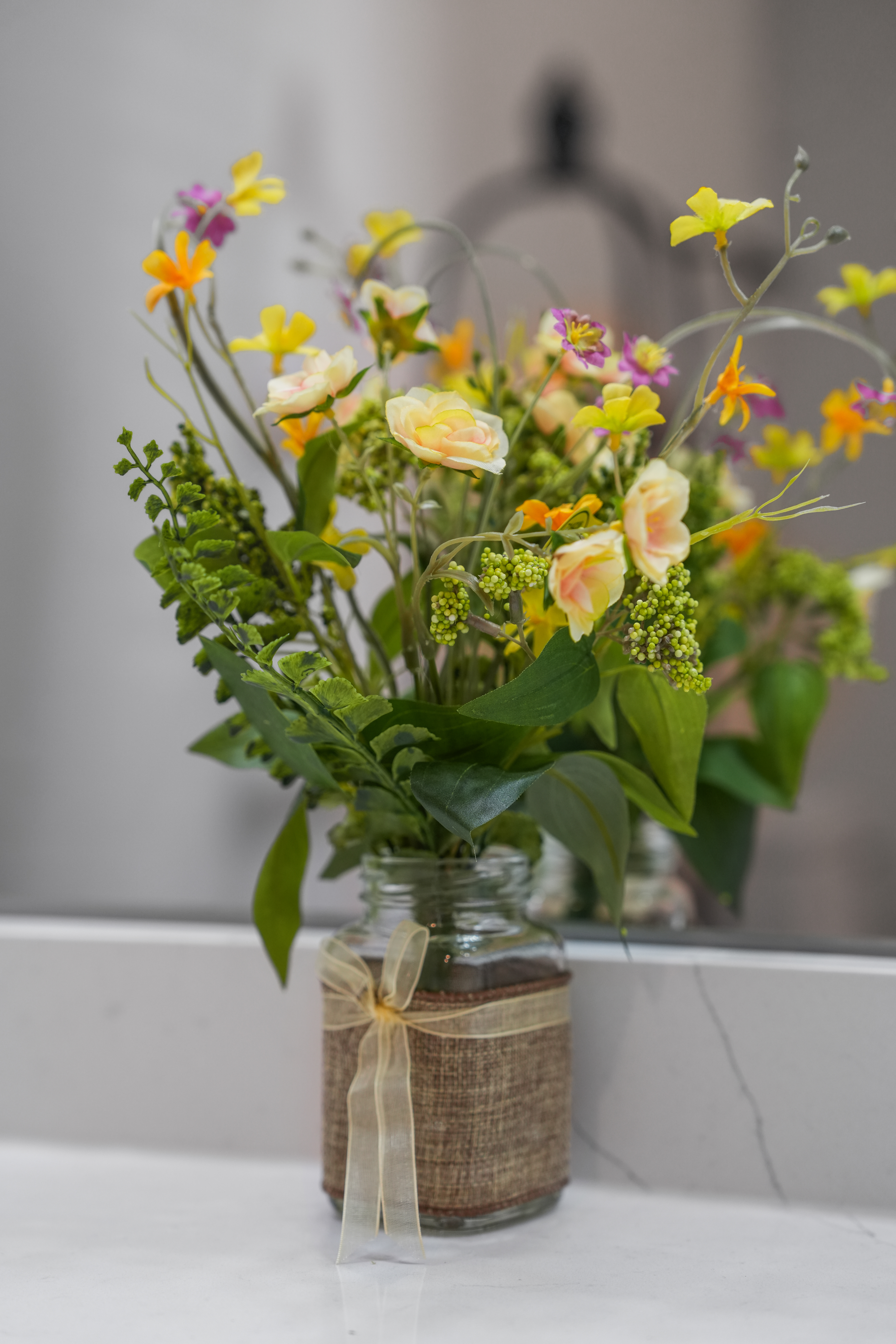 Charming floral accent with rustic touches for a warm, welcoming feel