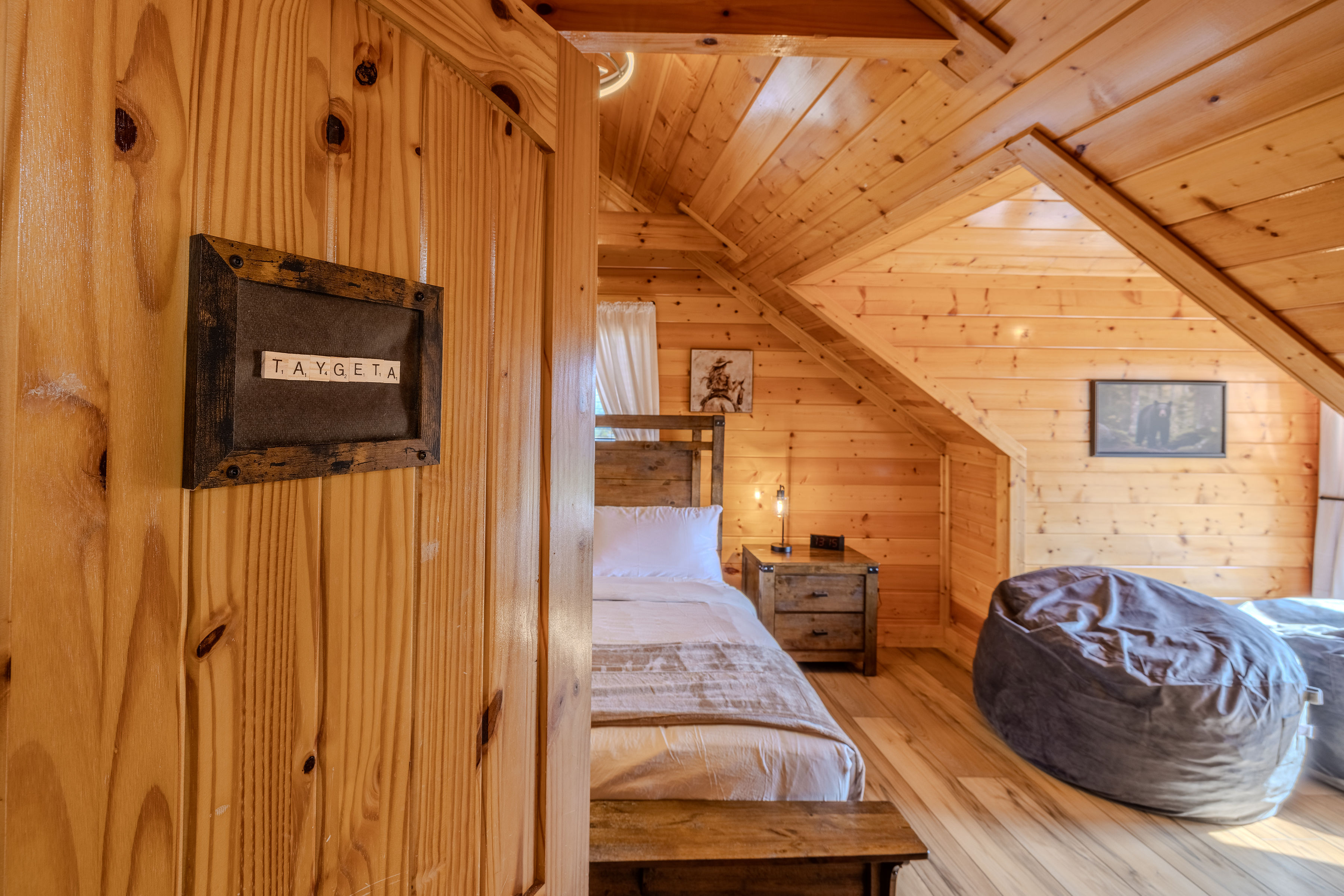 TAYGETA Cozy wood-lined loft bedroom with comfy lounge seating AND TV nook, top floor left side