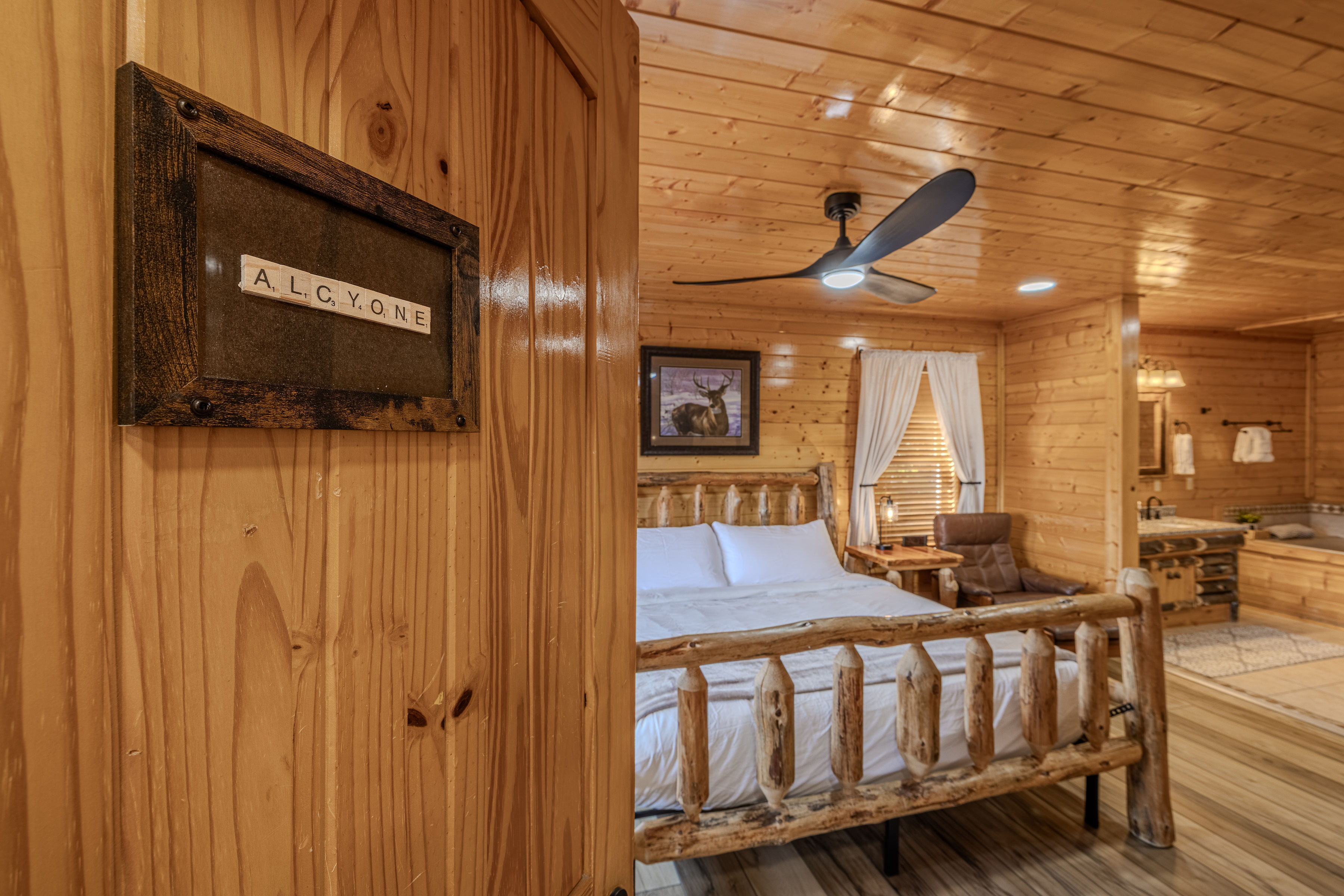 ALCYONE KING suite with warm wood interiors and relaxing garden jetted tub, bottom floor right side