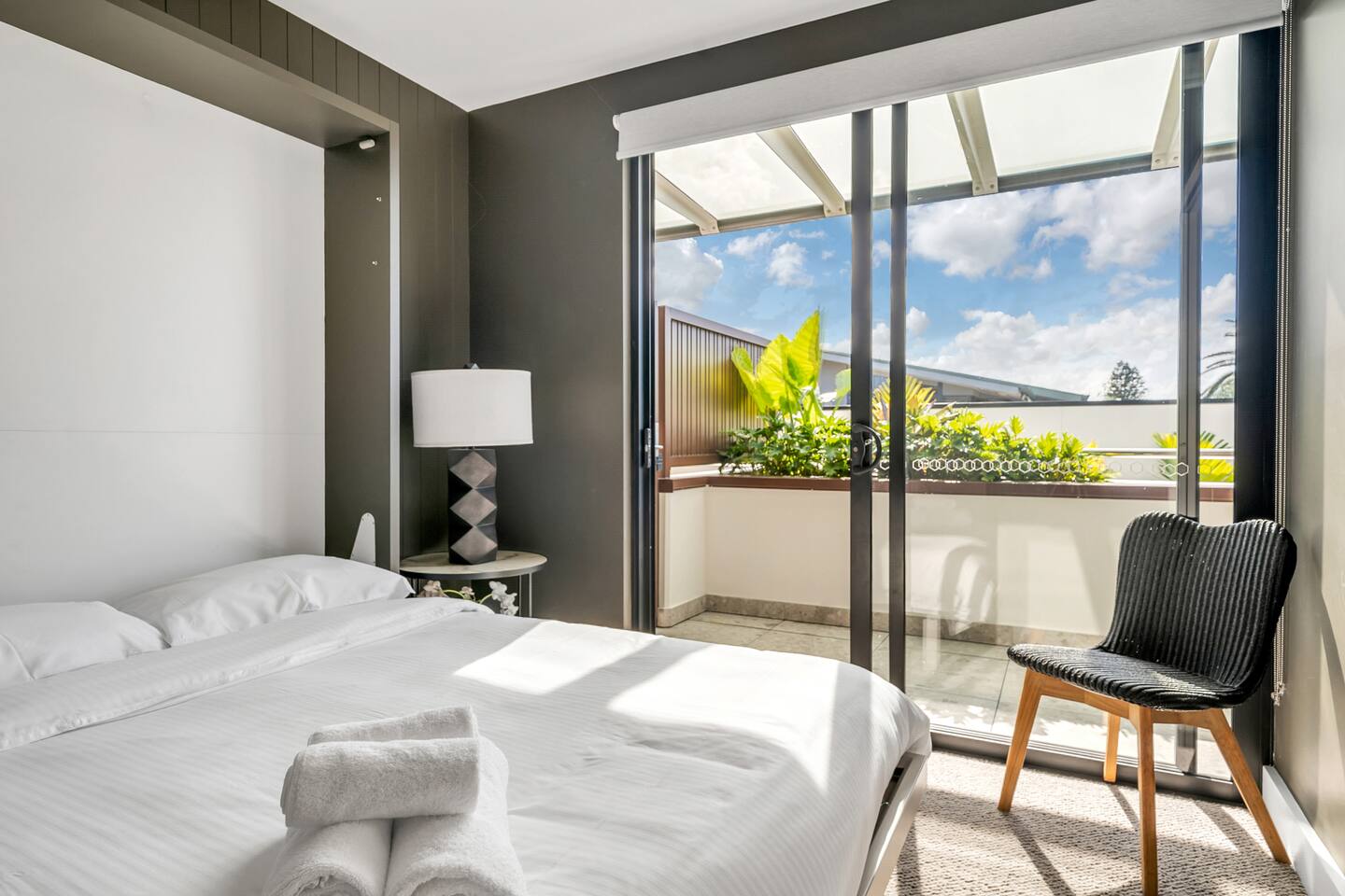 3rd bedroom with convertible wall bed/desk and northern sunshine