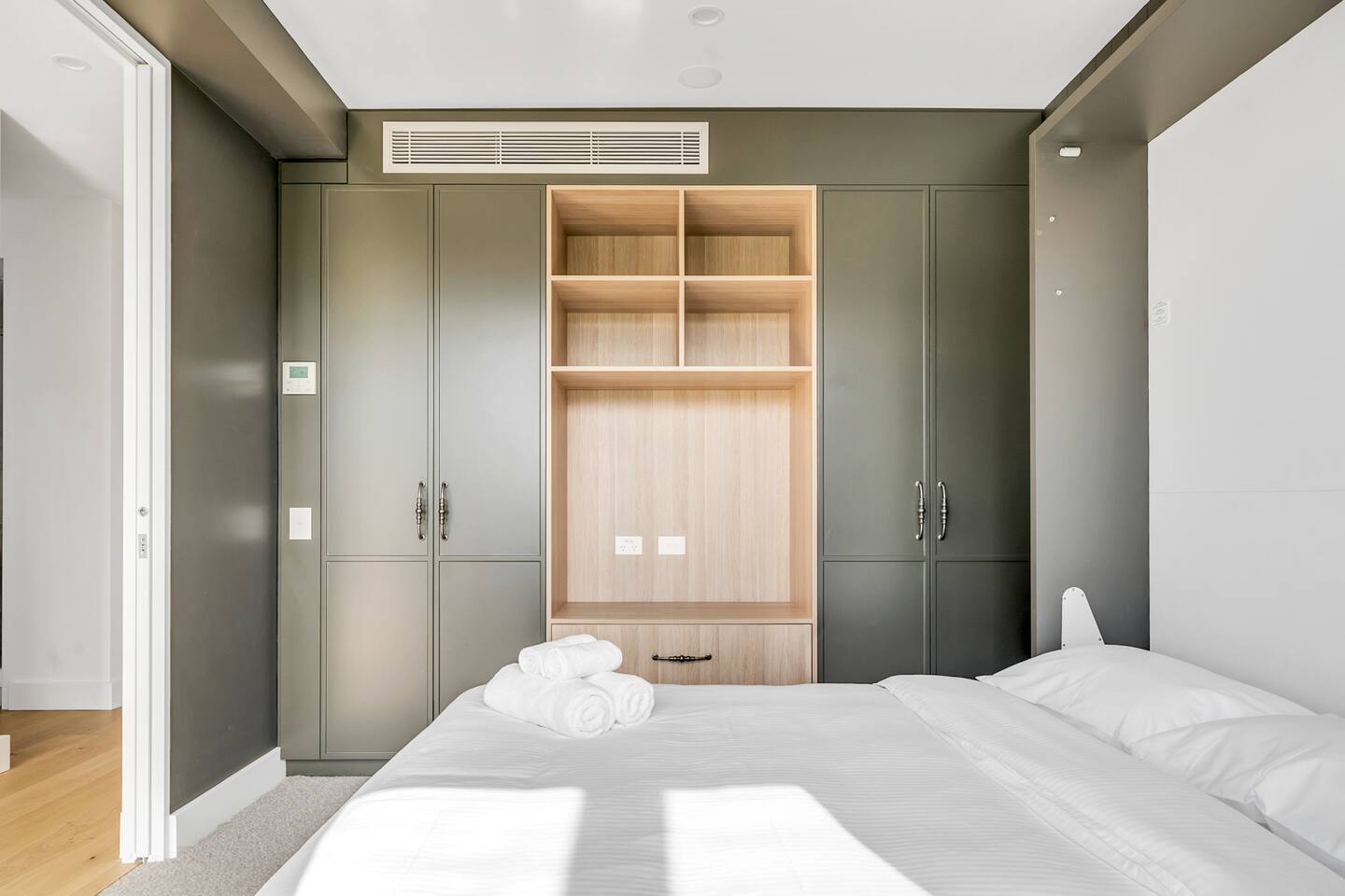3rd bedroom with convertible wall bed/desk and ample storage
