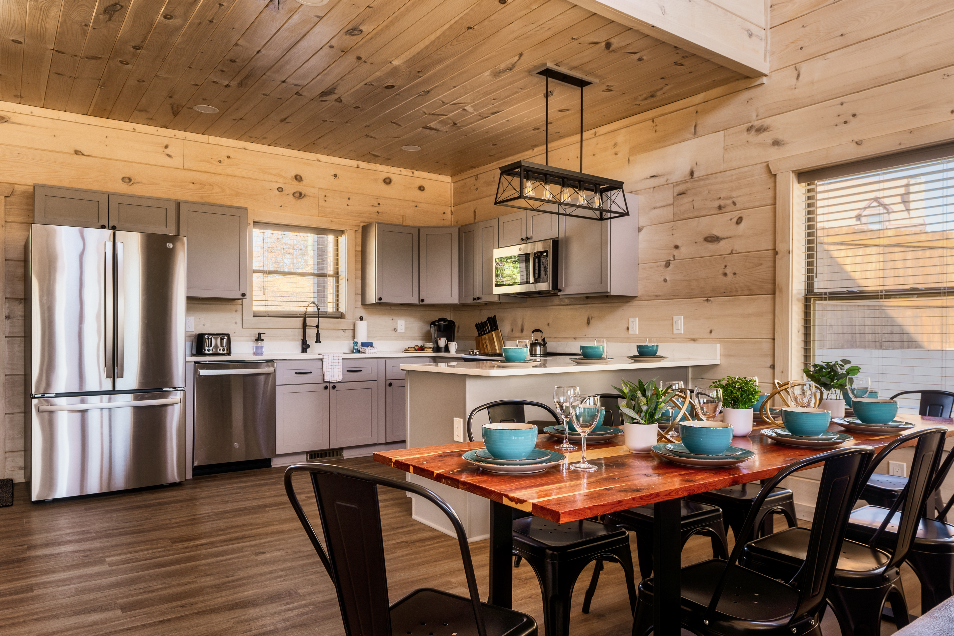 Cozy cabin kitchen and dining space perfect for gathering