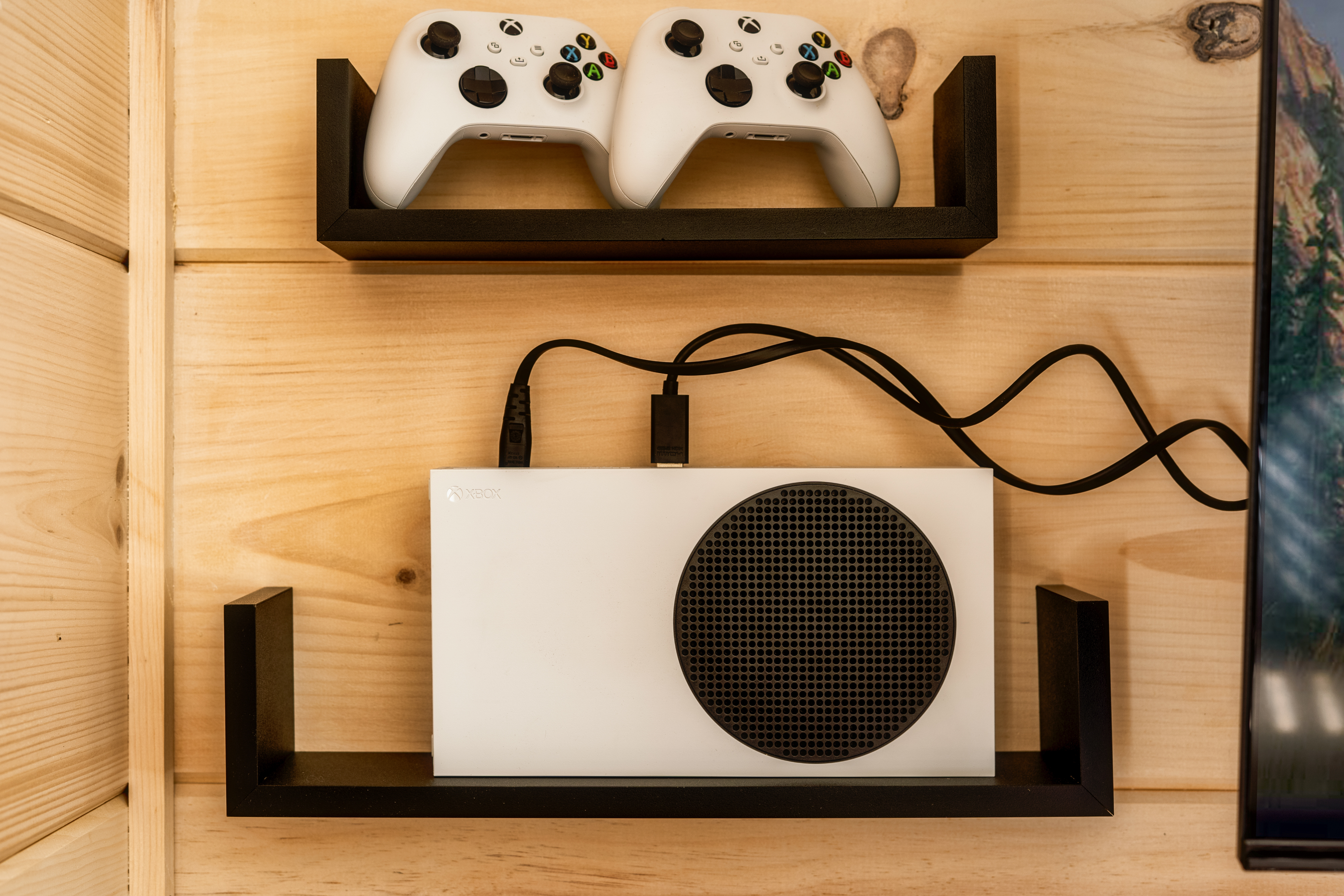 Xbox gaming setup with two controllers for fun, easy in-home entertainment