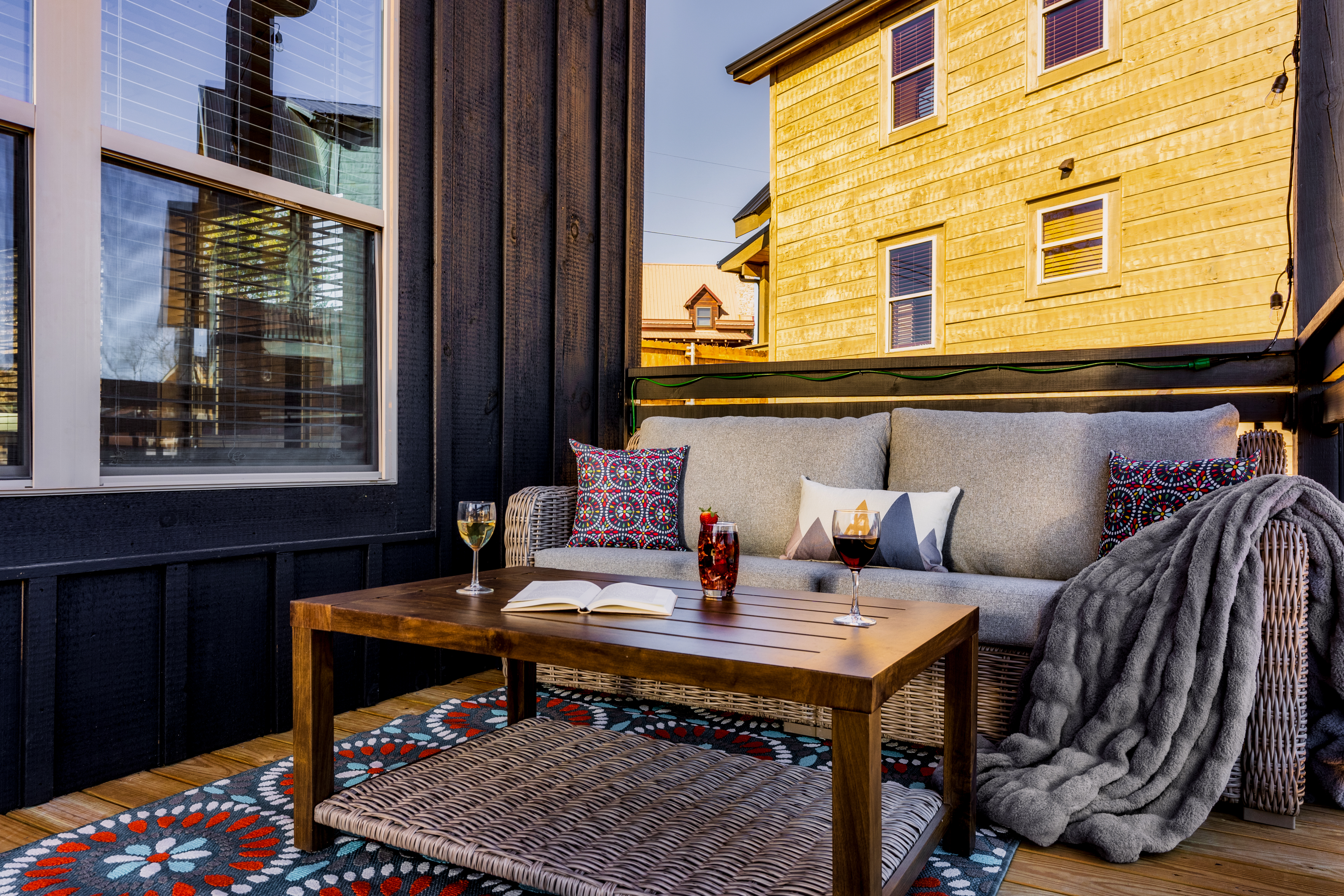 Cozy private deck with plush seating and a stylish lounge setup