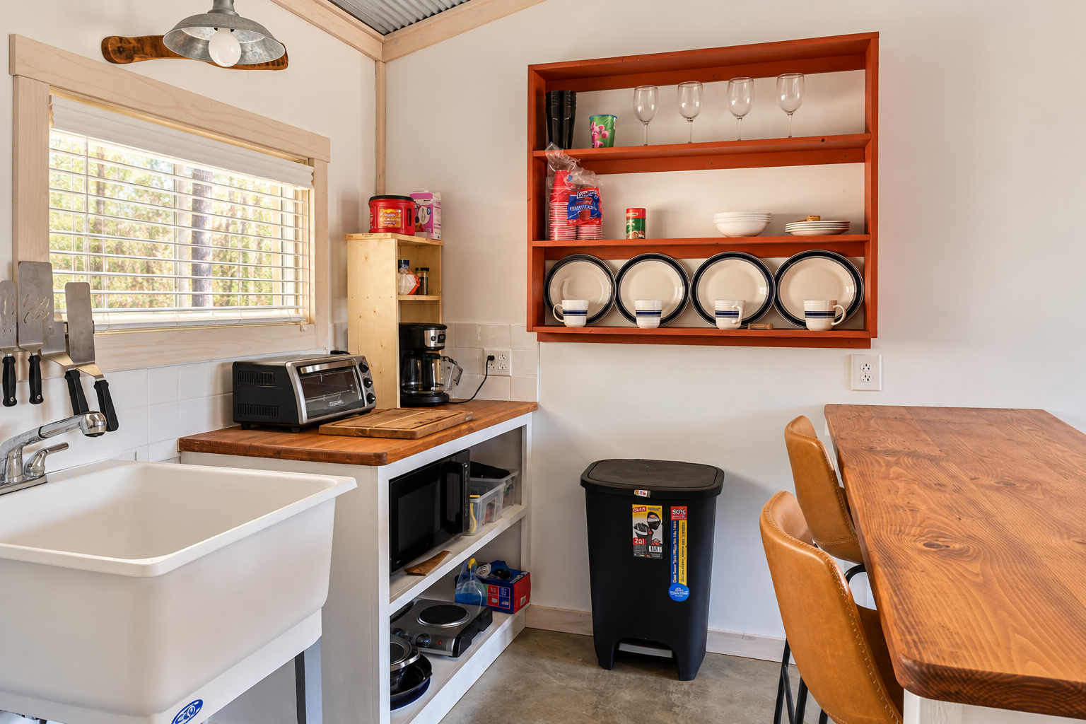 Cozy farmhouse-style kitchen with dining table and handy coffee station