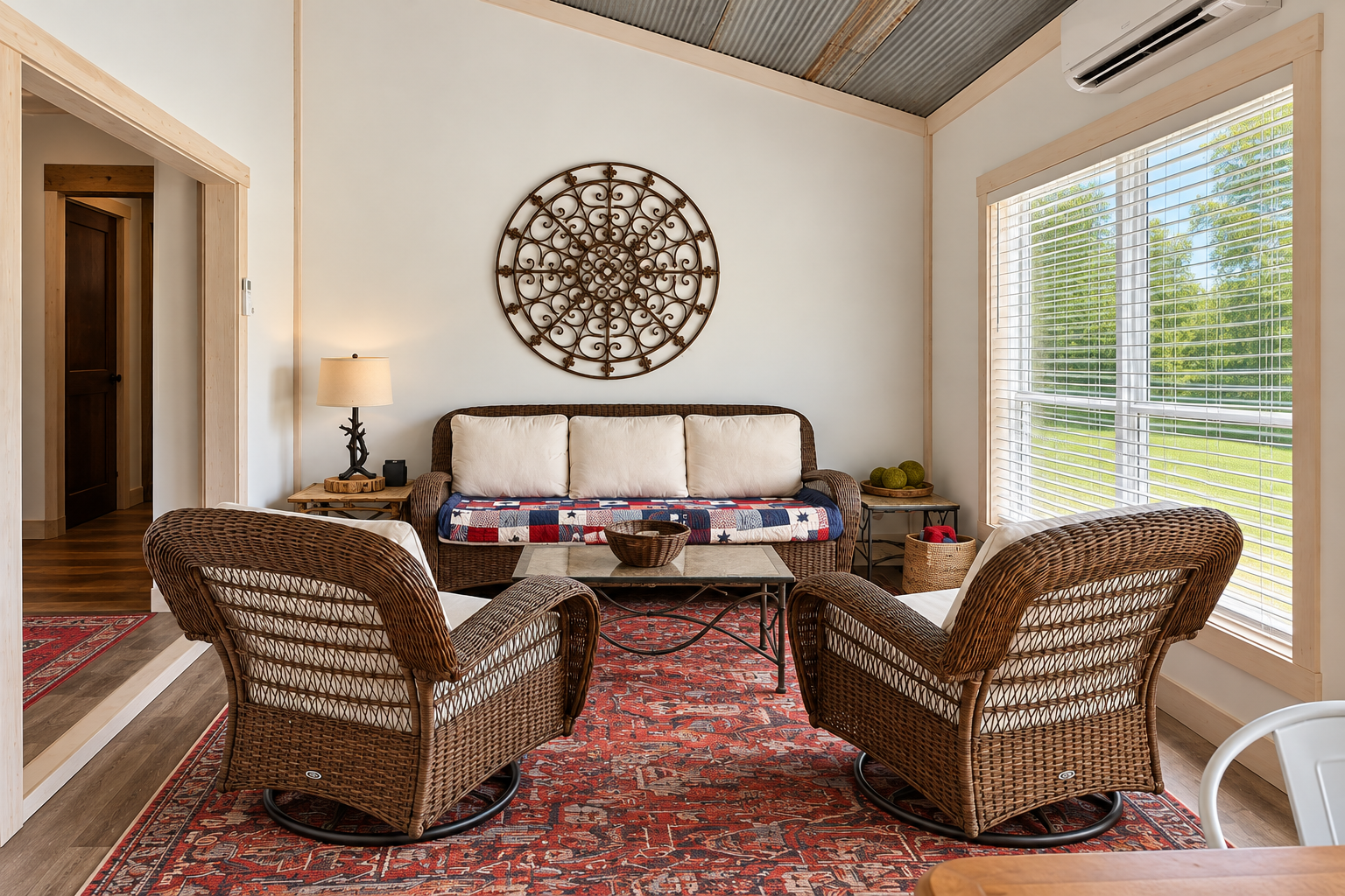 Bright, cozy lounge with wicker seating and large sun-filled windows