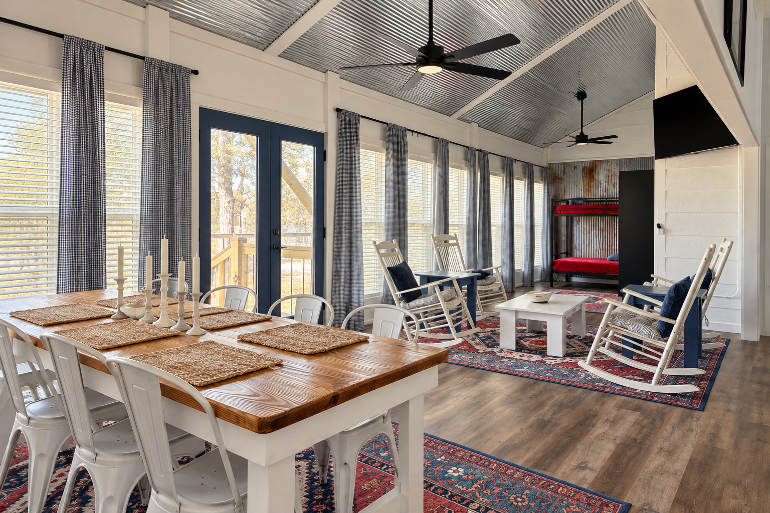 Bright rustic retreat with bunk beds, rocking chairs, and vaulted ceilings
