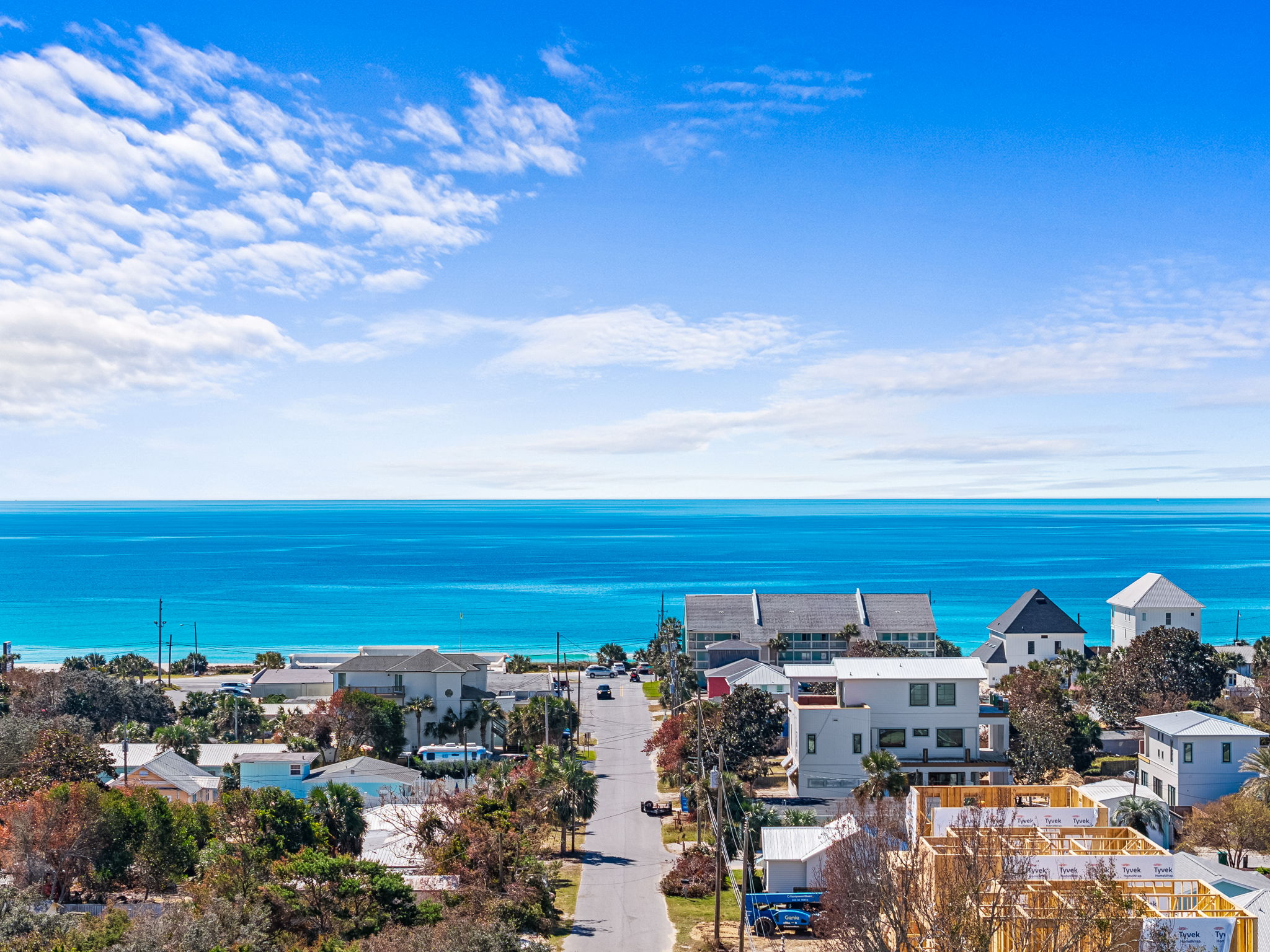 Bright coastal neighborhood with stunning turquoise ocean views