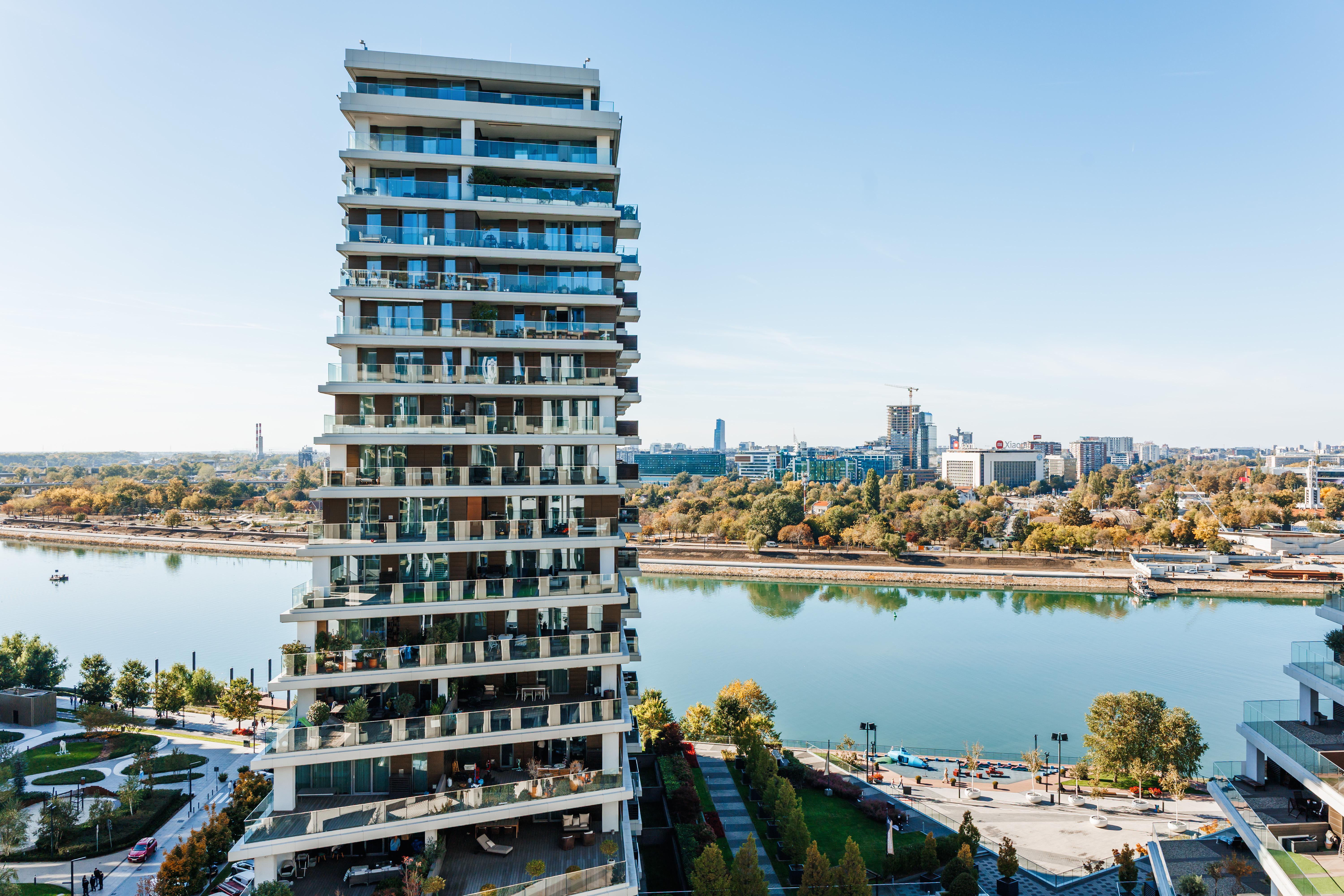 Modern waterfront tower with river views and expansive private balconies