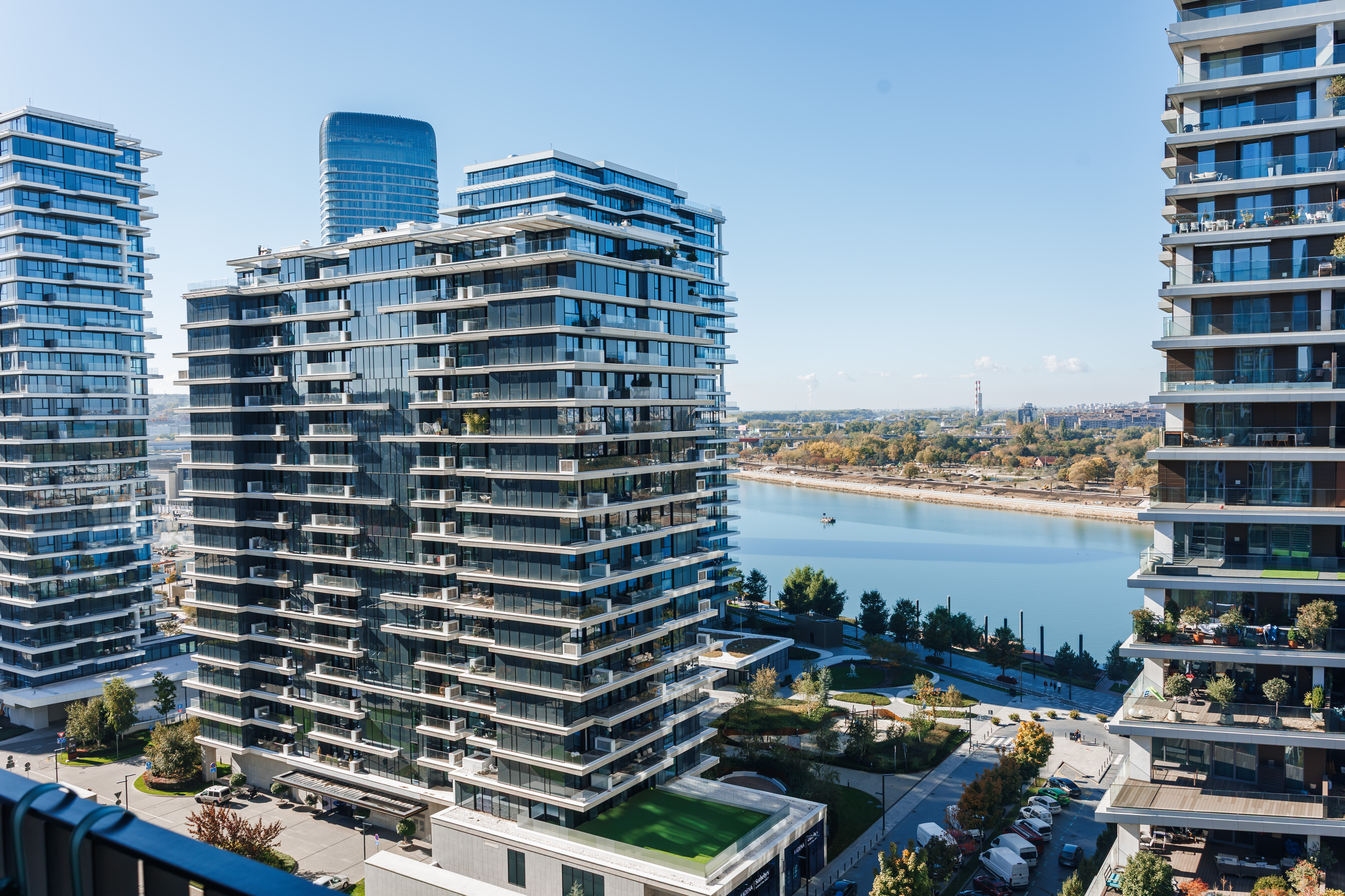 Bright high-rise views overlooking the waterfront and modern city skyline