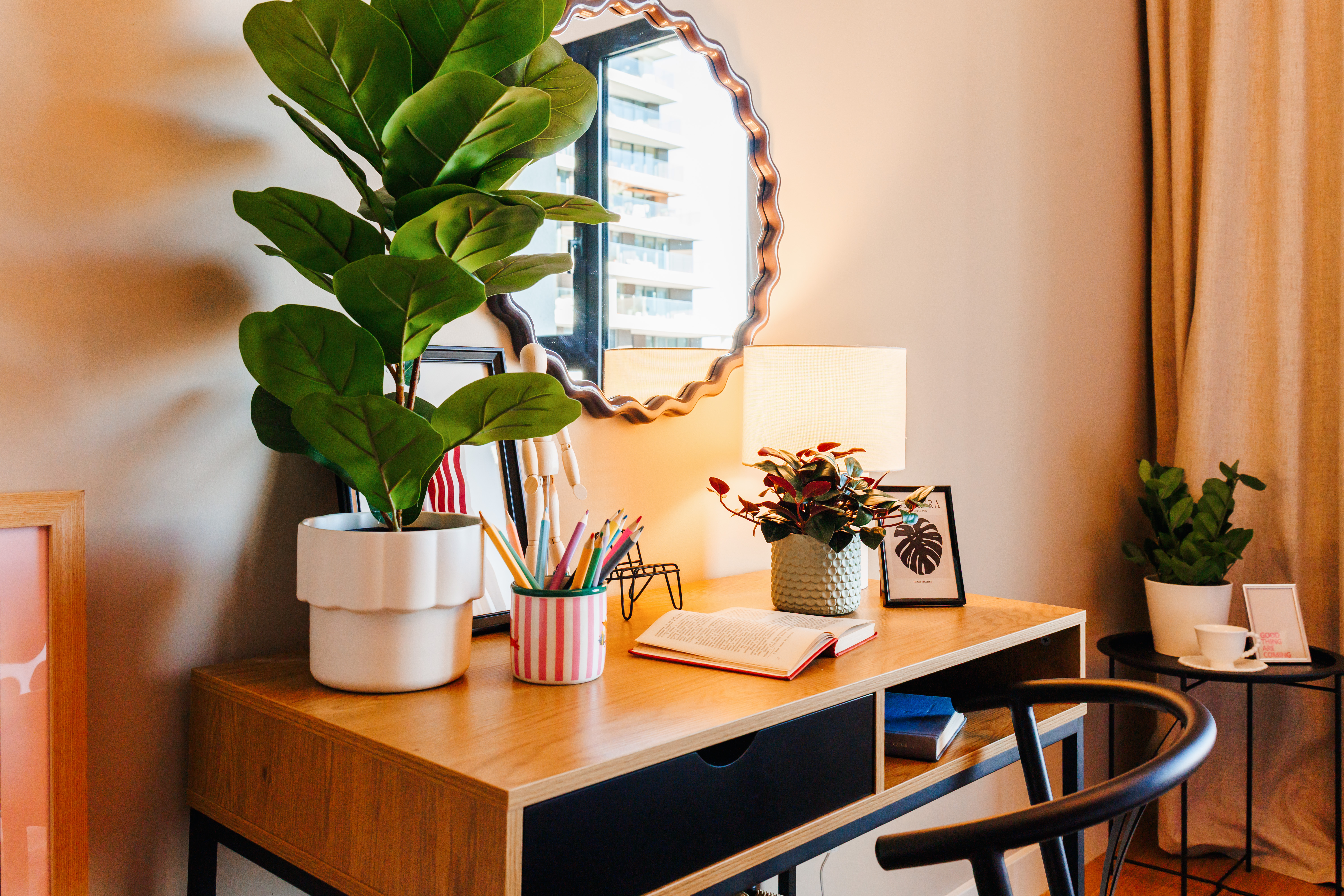 Cozy, plant-filled workspace with warm lighting and modern style