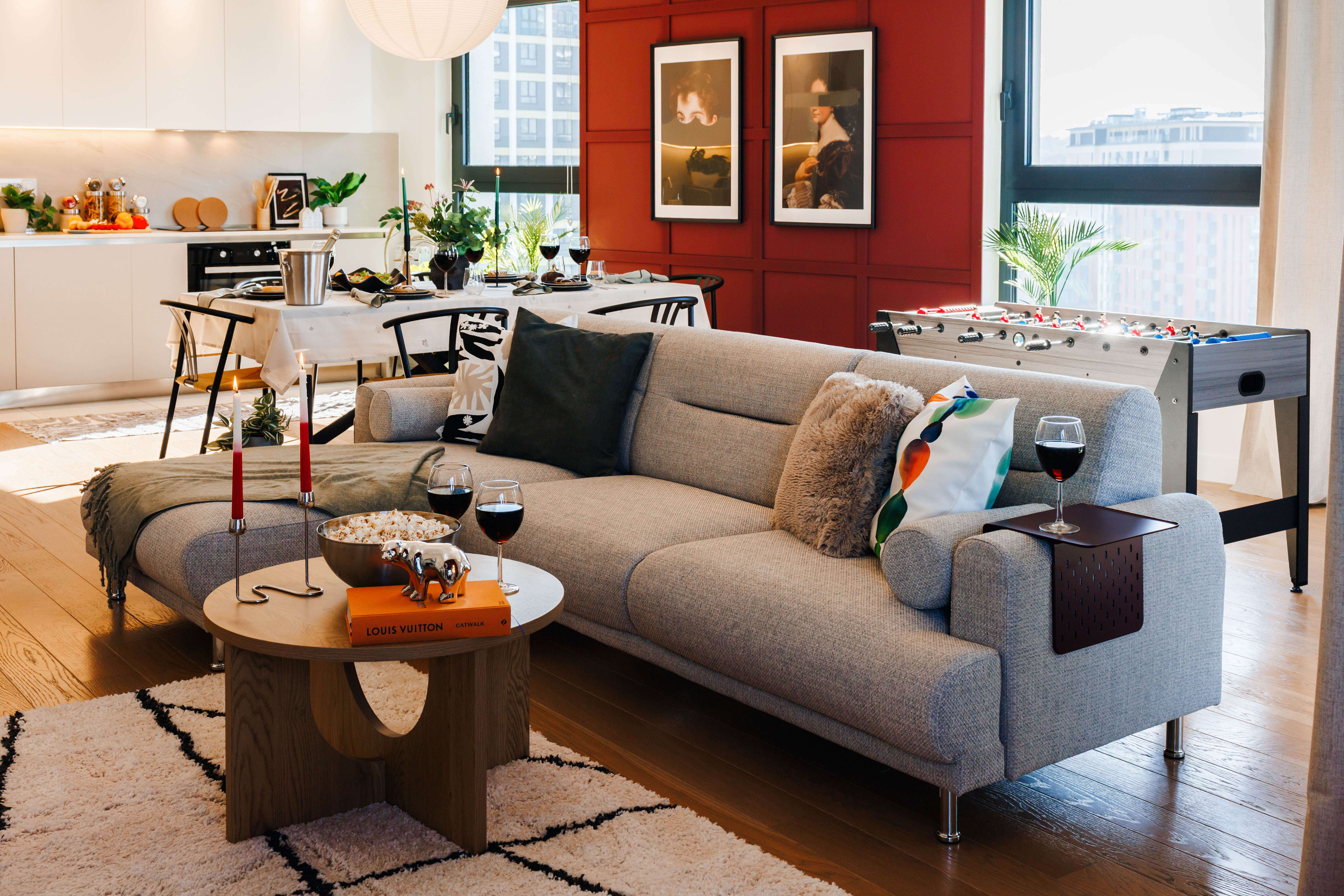 Stylish city living with skyline views, designer decor, and a fun foosball table