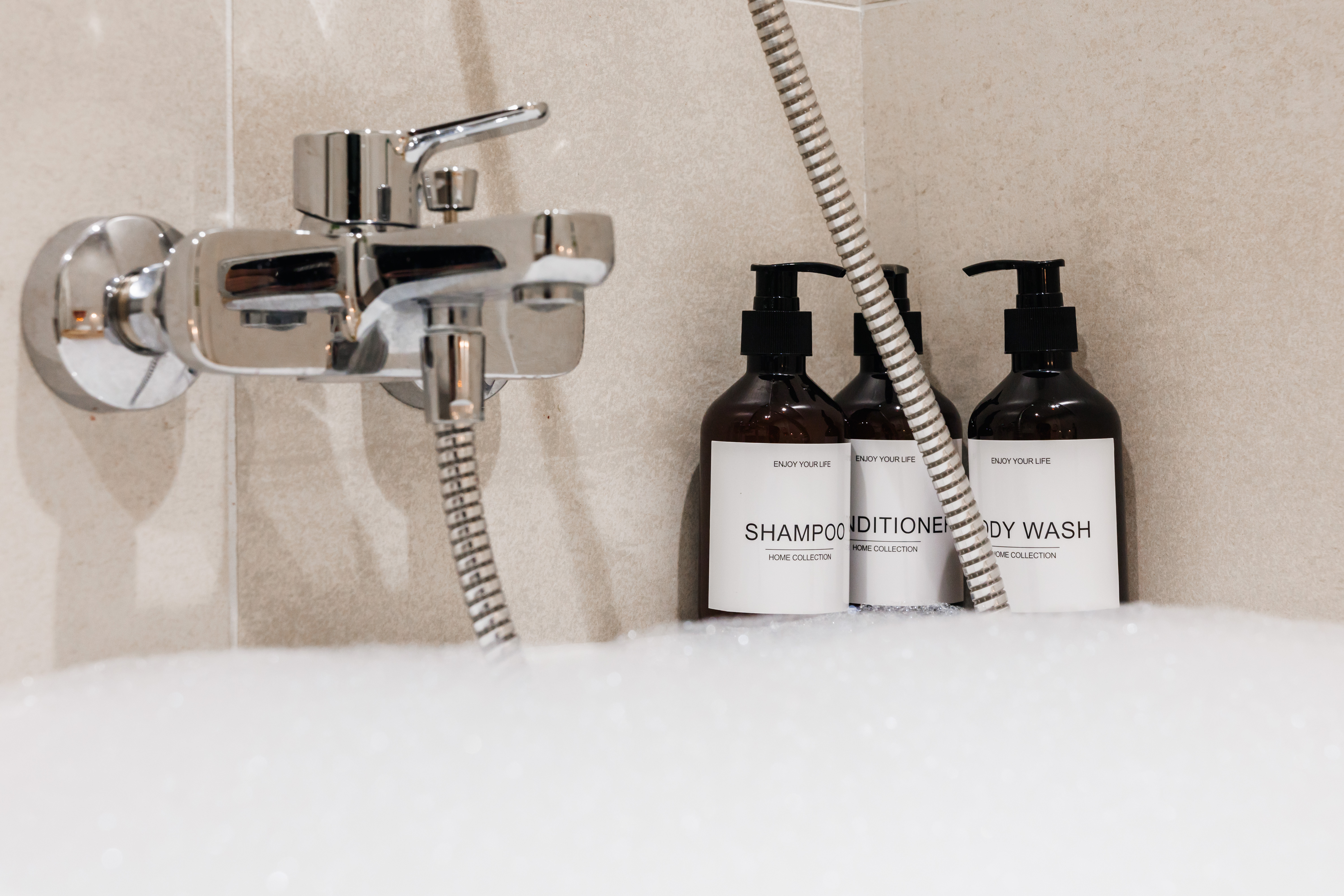 Modern soaking tub with sleek fixtures and premium bath amenities
