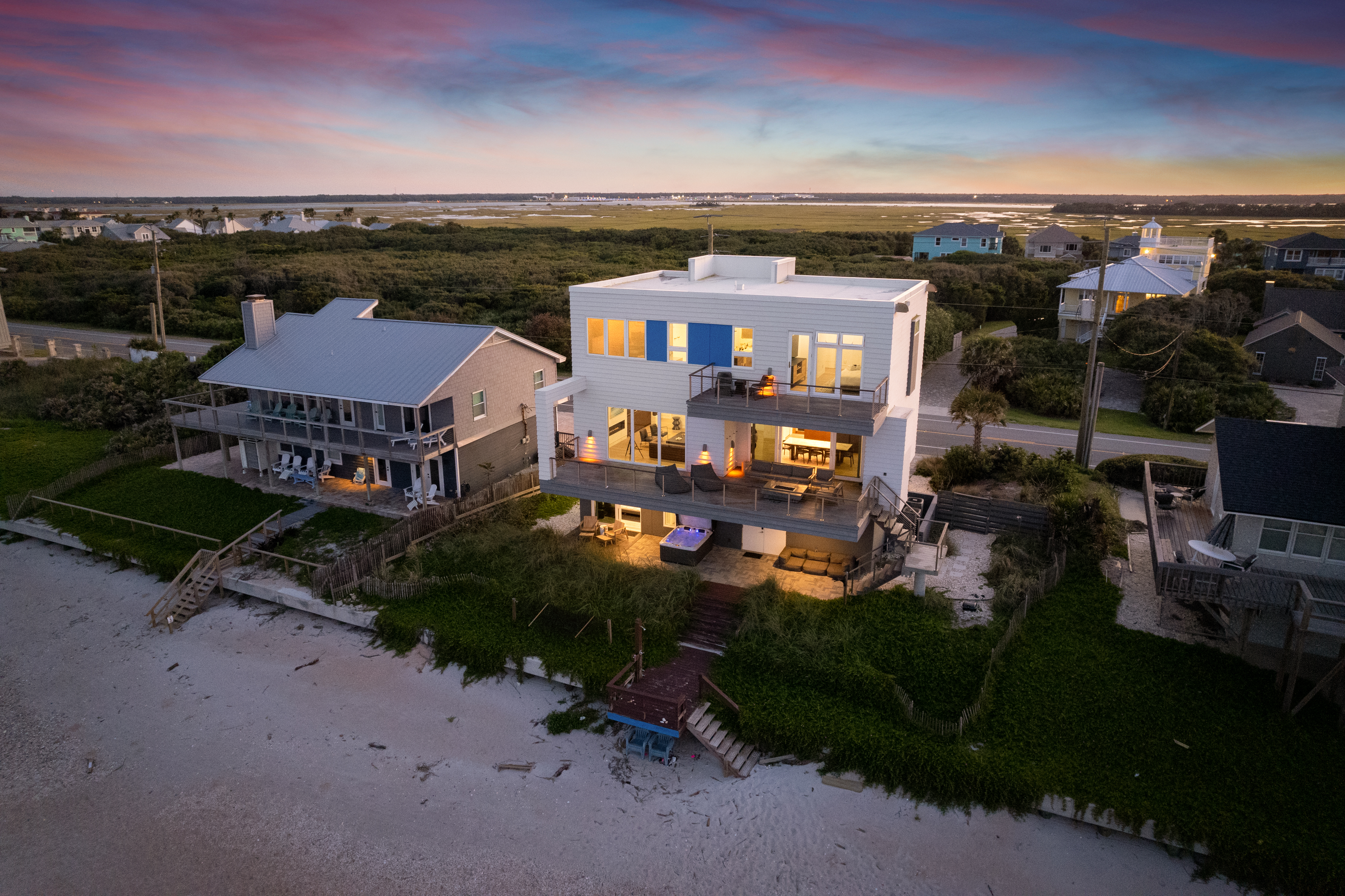 Stunning beachfront home with spacious decks and sunset coastal views