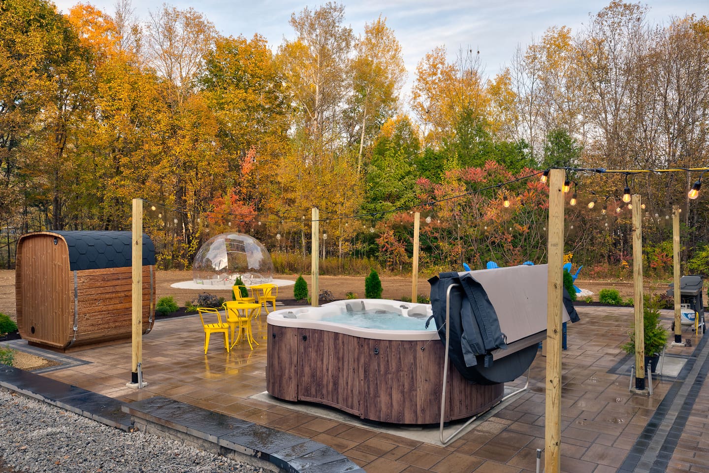 Enjoy your outdoor oasis featuring a sauna, bubbling hot tub, alfresco dining, and bistro lights. Perfect for unwinding after skiing, hiking, or exploring North Conway and the White Mountains. Gather, relax, and make memories under the stars.