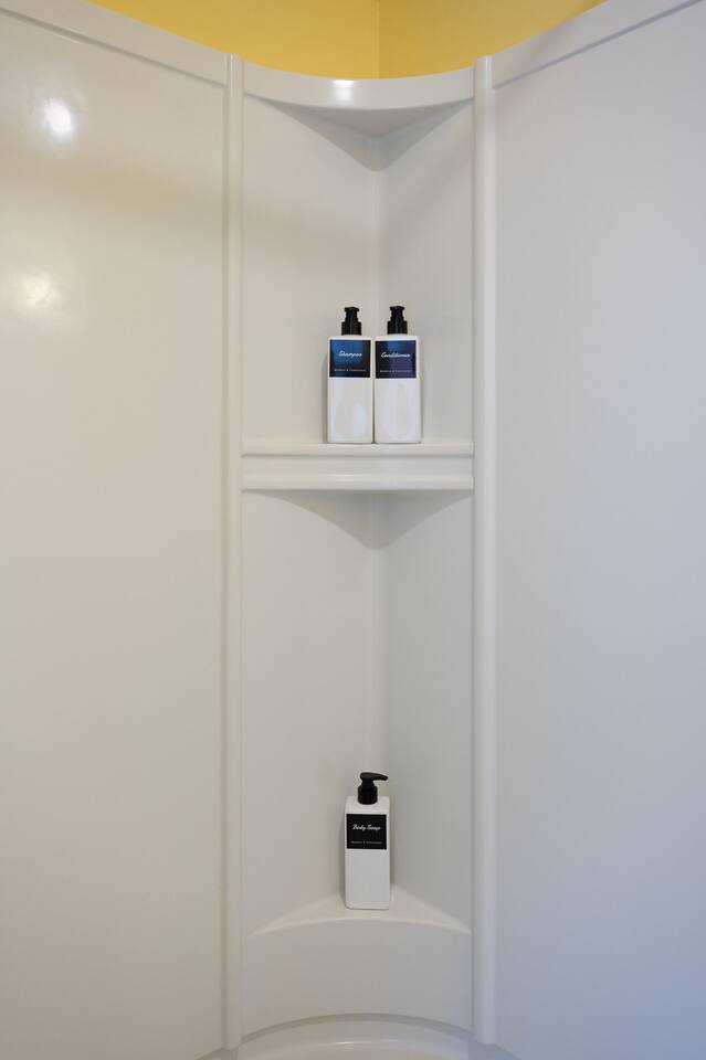 Freshen up in your well-appointed bathroom, stocked with plush towels, makeup towel, shampoo, conditioner, body wash, and hand soap. Enjoy thoughtful amenities and hotel-inspired comforts during your stay at The Hillfort Escape in North Conway.