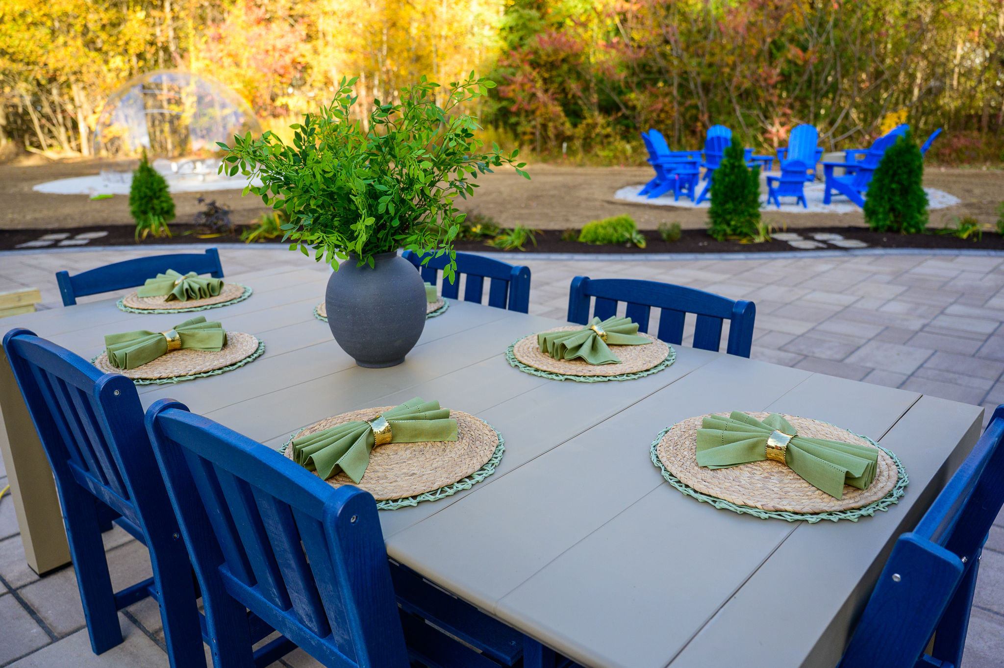 Spacious patio dining with cozy backyard seating and stylish outdoor charm