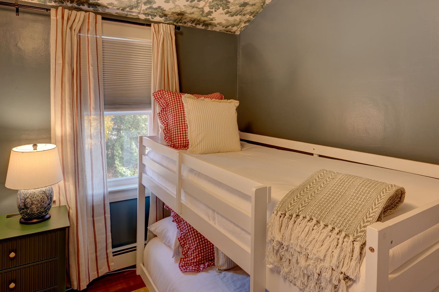 Enjoy our bunk room featuring a double-over-double and twin-over-twin bunk bed, plus a Roku TV with Guest Mode. Perfect for families and groups, this cozy space offers comfort and entertainment after exploring North Conway and the White Mountains.