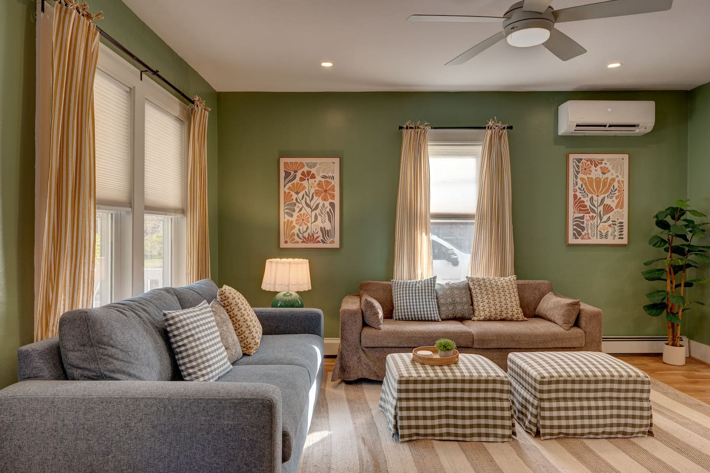 Relax in the living room featuring a cozy fireplace, record player, and Roku TV with Guest Mode. Perfect for movie nights, music, or gathering with family and friends after skiing, hiking, or exploring North Conway and the White Mountains.