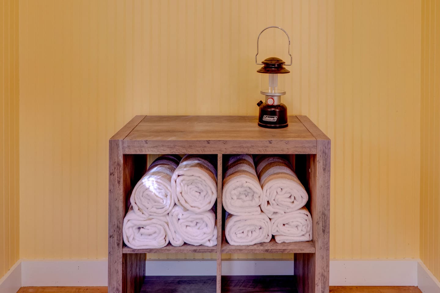 Fresh hot tub towels are conveniently provided on a dedicated towel rack, making it easy to relax and unwind in your private hot tub after a day of skiing, hiking, or exploring North Conway and the White Mountains.