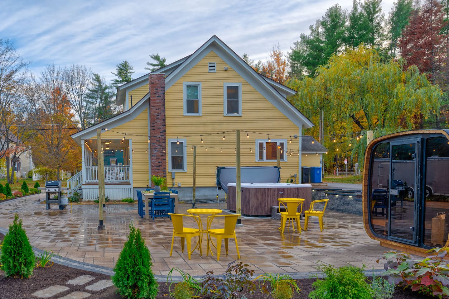 Unwind in your outdoor oasis featuring a hot tub, sauna, Weber BBQ grill, alfresco dining, and bistro lights. Perfect for relaxing after exploring North Conway and the White Mountains, enjoying outdoor meals, and making memories under the stars.