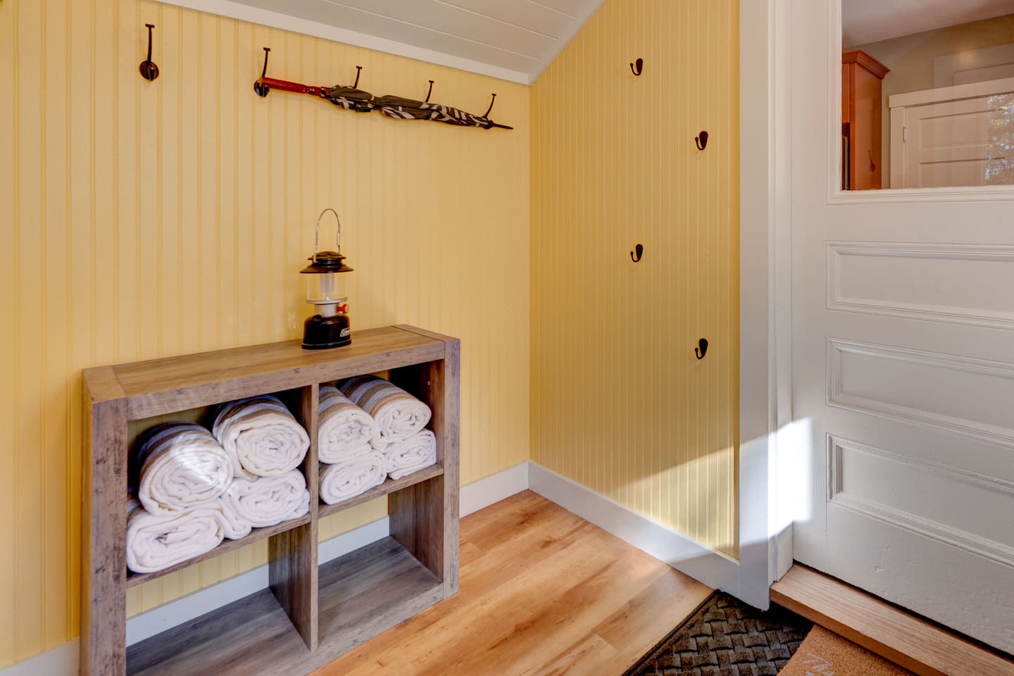 Fresh hot tub towels are conveniently provided on a dedicated towel rack, making it easy to relax and unwind in your private hot tub after a day of skiing, hiking, or exploring North Conway and the White Mountains.