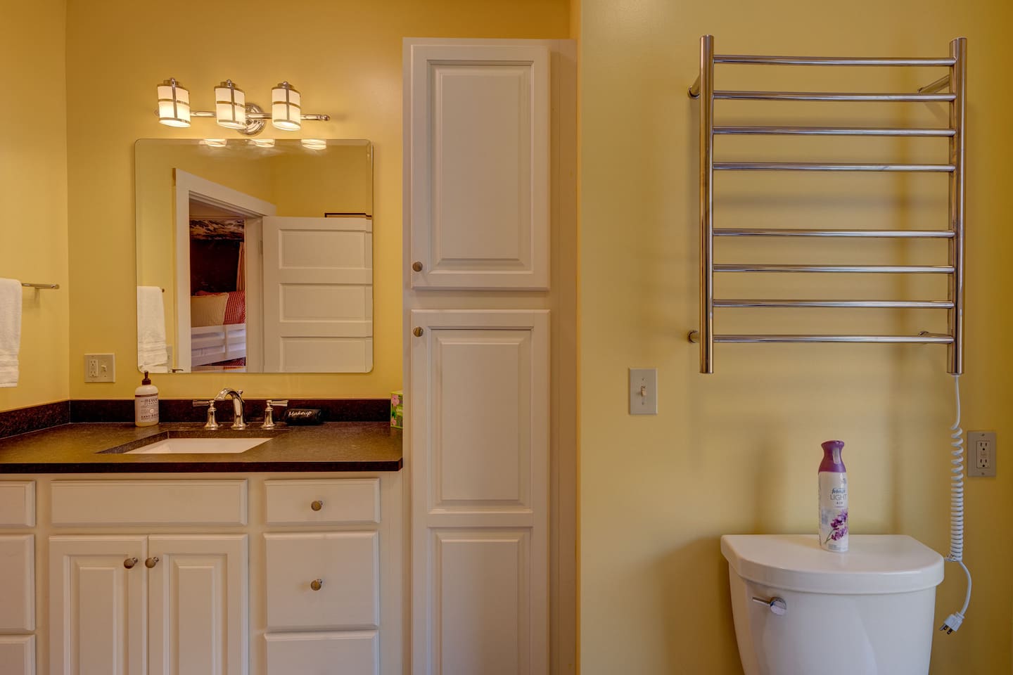 Bathroom towel rack and linen cabinet