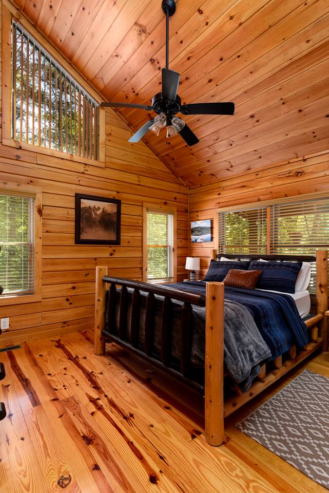 The master bedroom- Frye bedding on a queen sized bed.