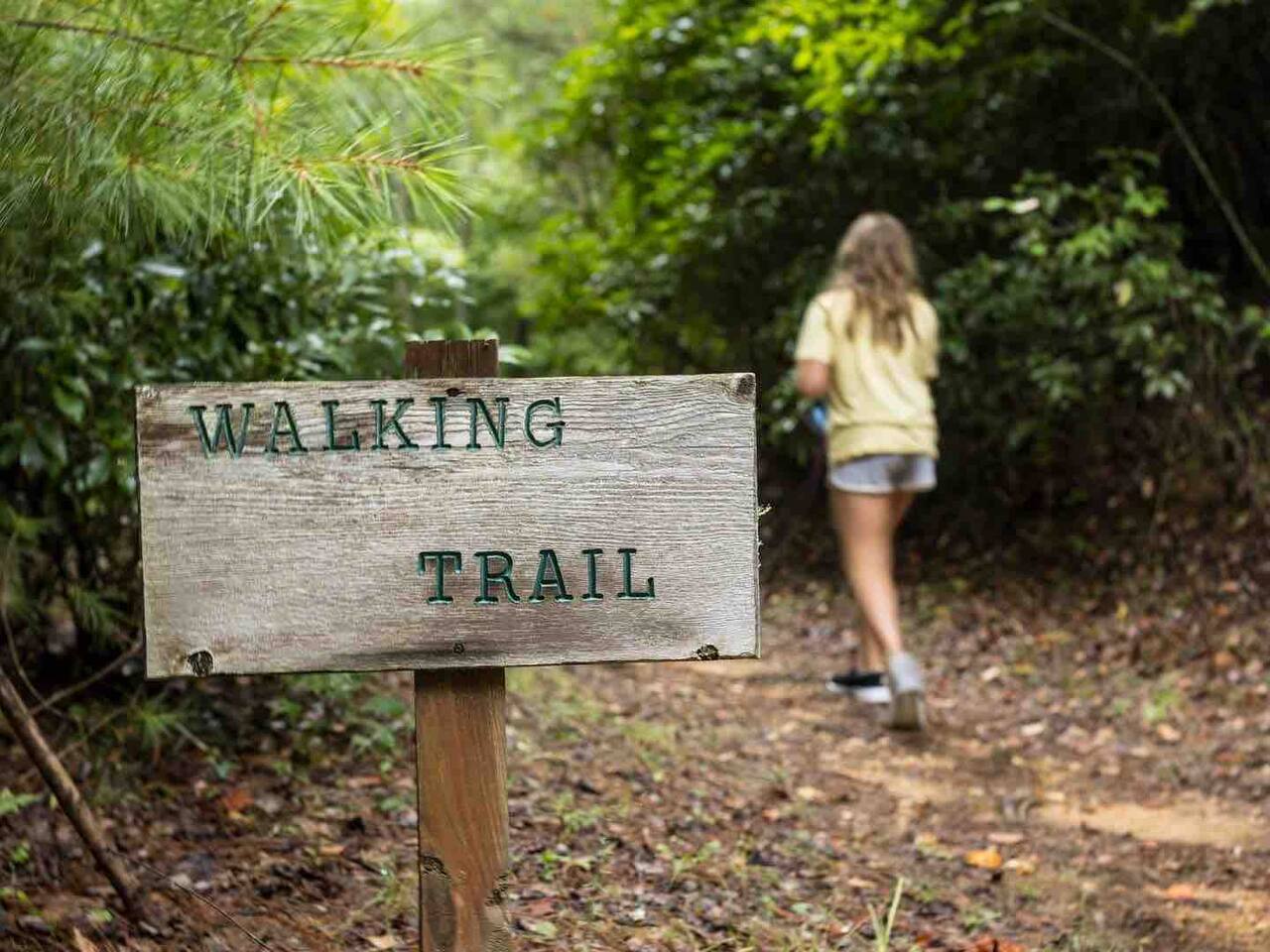 The trail is almost a mile and a half but it’s got some hills so find a walking stick on the way!