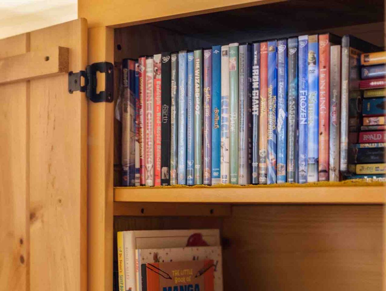 Kid’s movies in the bunk room wall cabinet!