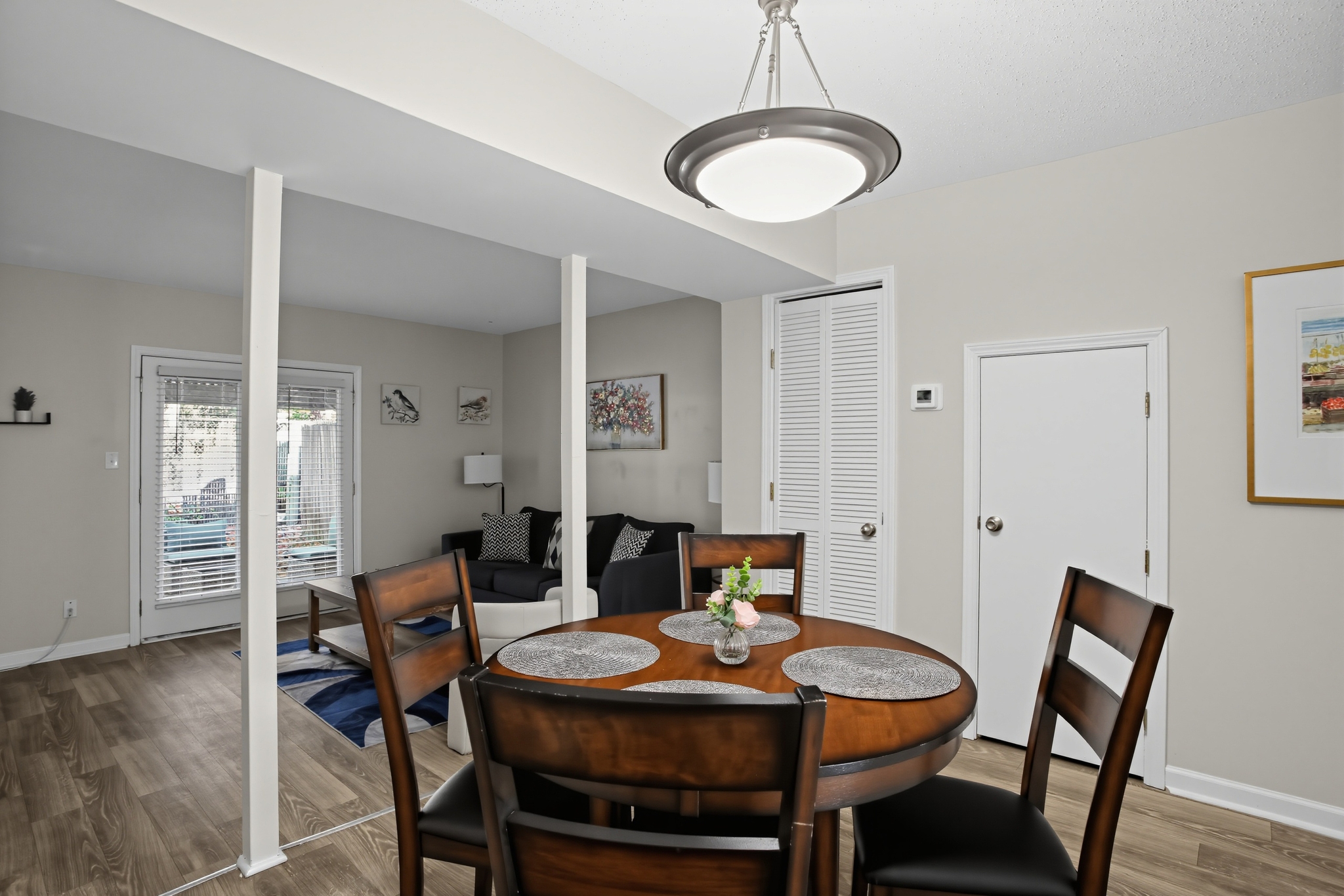 Bright open dining area with stylish seating and easy flow to the living room