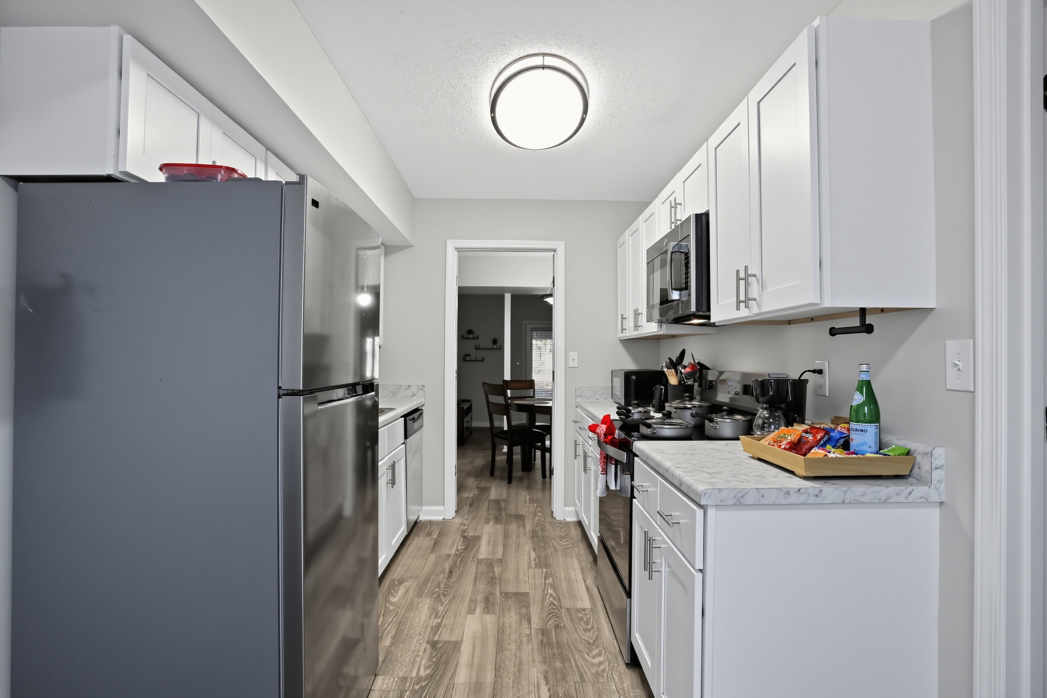 Bright modern kitchen with stainless appliances and stylish finishes